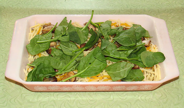 My added vegetable layer of spinach and mushrooms which replaced the meat.