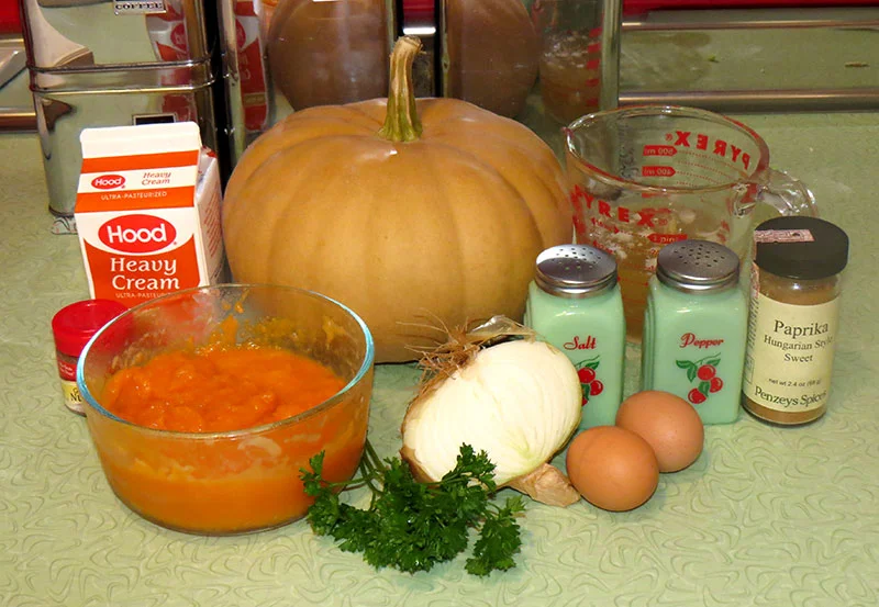 The ingredients for cream of pumpkin soup. That is a long island cheese pumpkin is in the background.