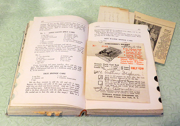 The sponge cake recipe with some clippings and the original sales receipt from 1940.