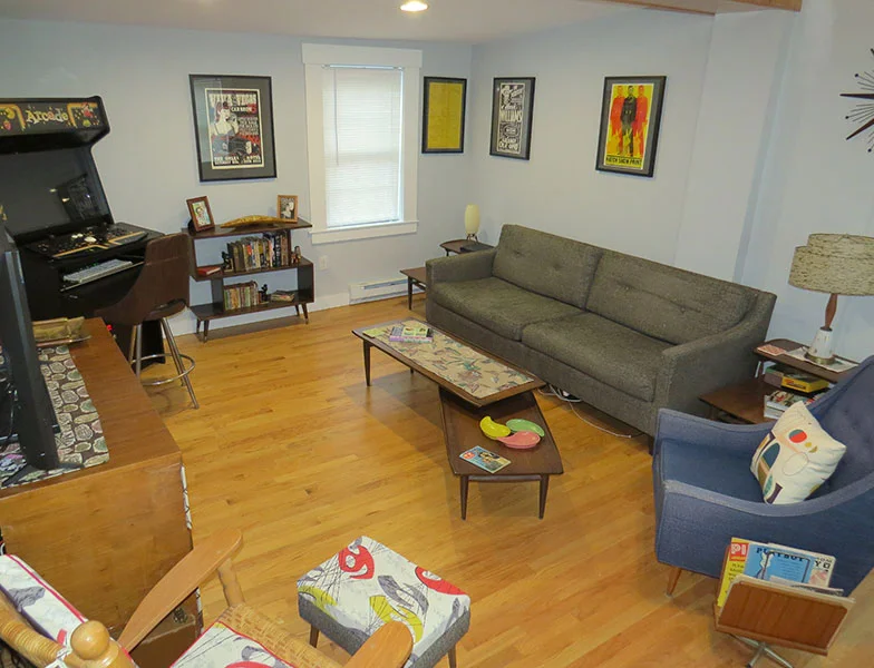Our living room with our new bookshelf