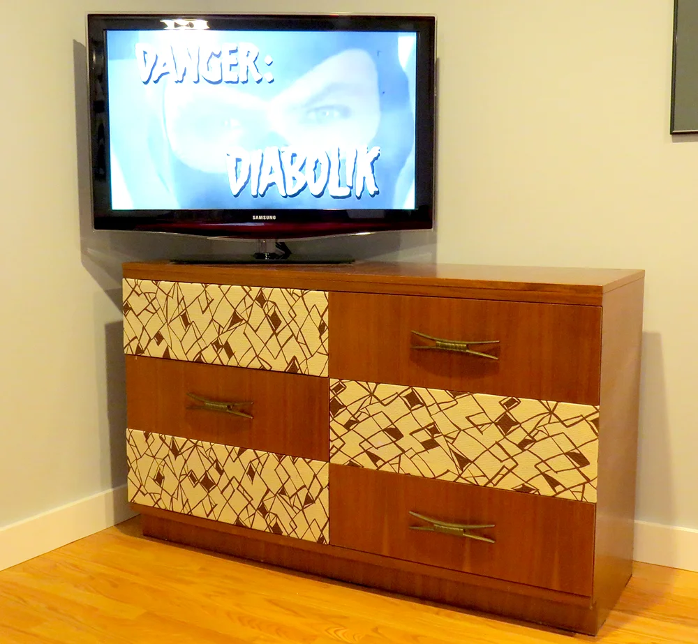 The original entertainment center made from a vintage dresser.