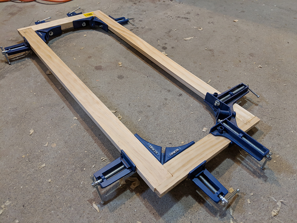 An assembled panel frame with my trusty corner clamps.