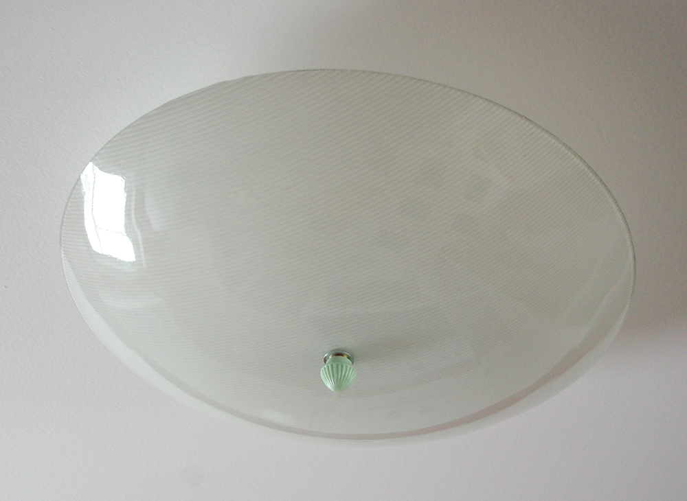 The original bent glass fixture.