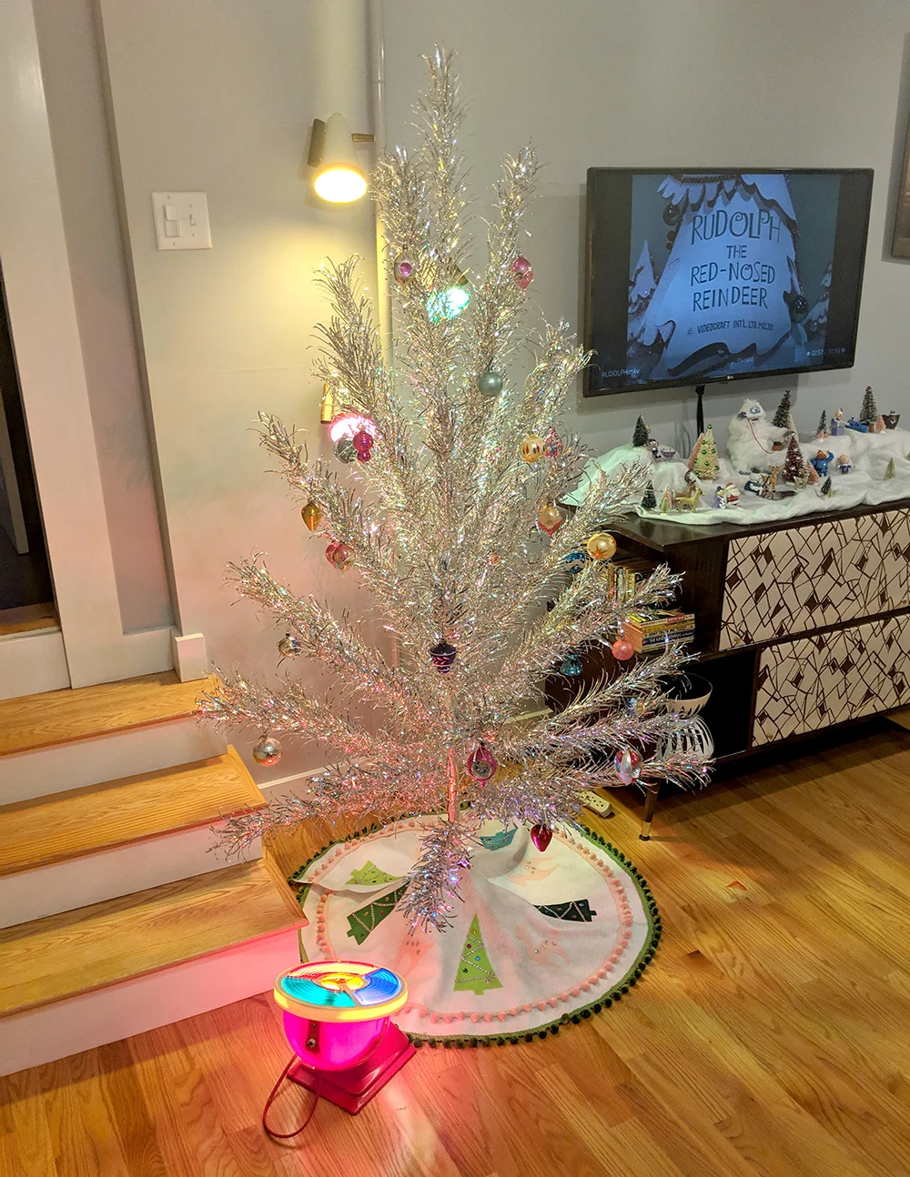 Our living room with sparkly aluminum Christmas tree