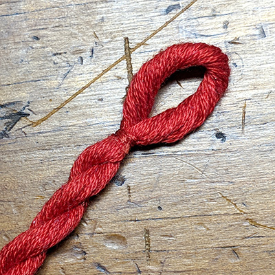 The loop end of the cord with closed off loop.