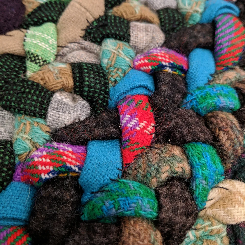 The bottom of the rug stitched for a sturdier rug.