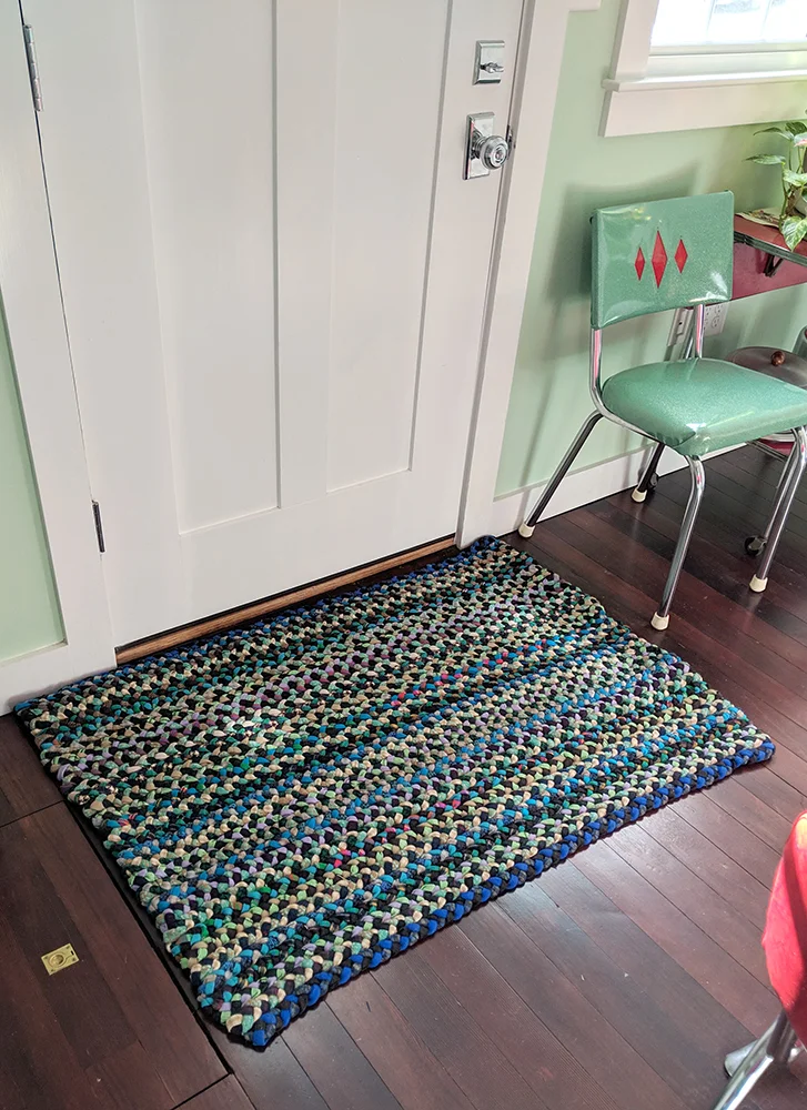 The final rug in front of the door