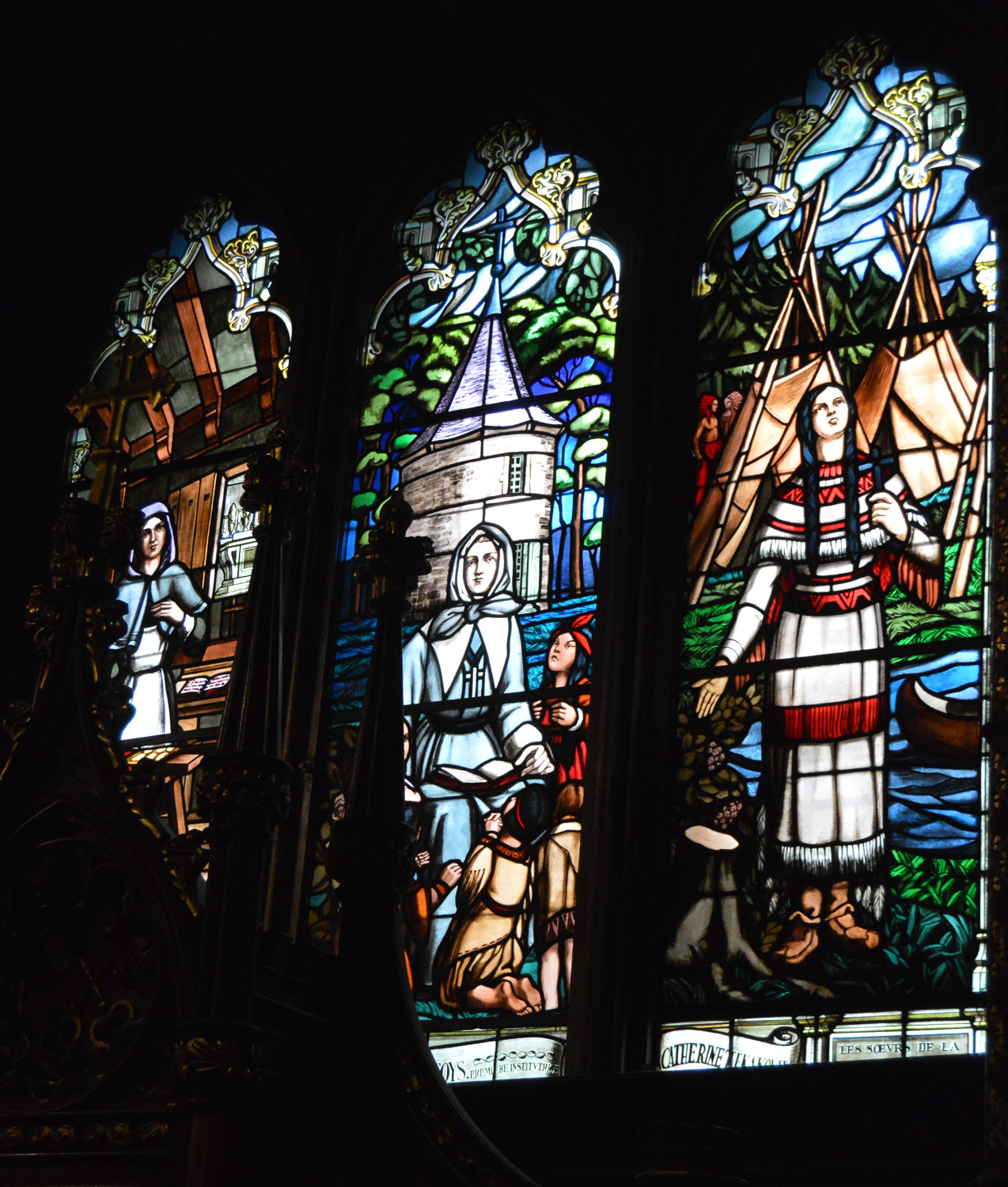 Stained glass depicting religious history of Montreal.