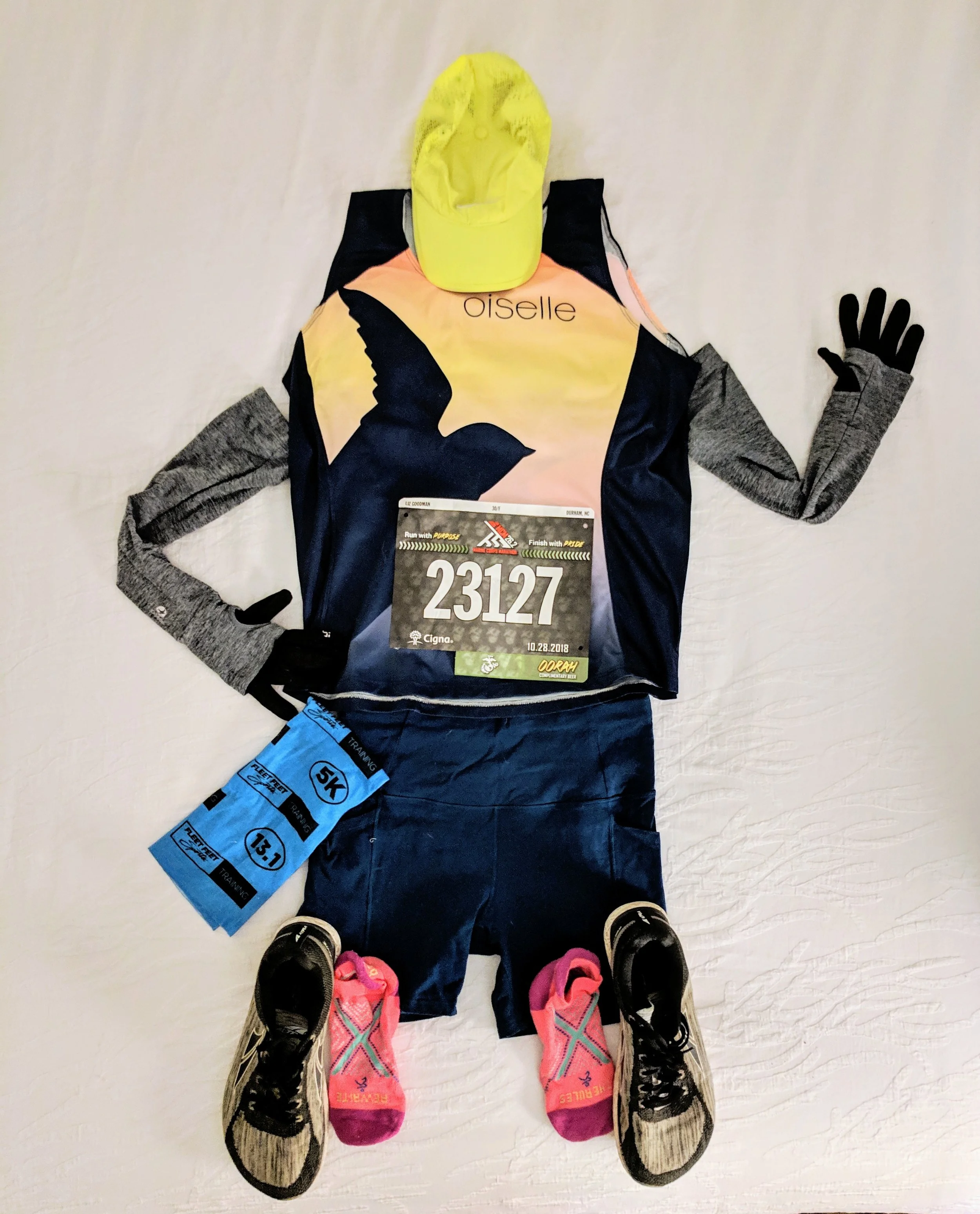 Flat Liz Version 1. Apparently it’s a thing to take a photo of your race outfit the night before your marathon as you lay out everything in preparation. Except…well…you know me. I have to ruin everything. See Version 2…
