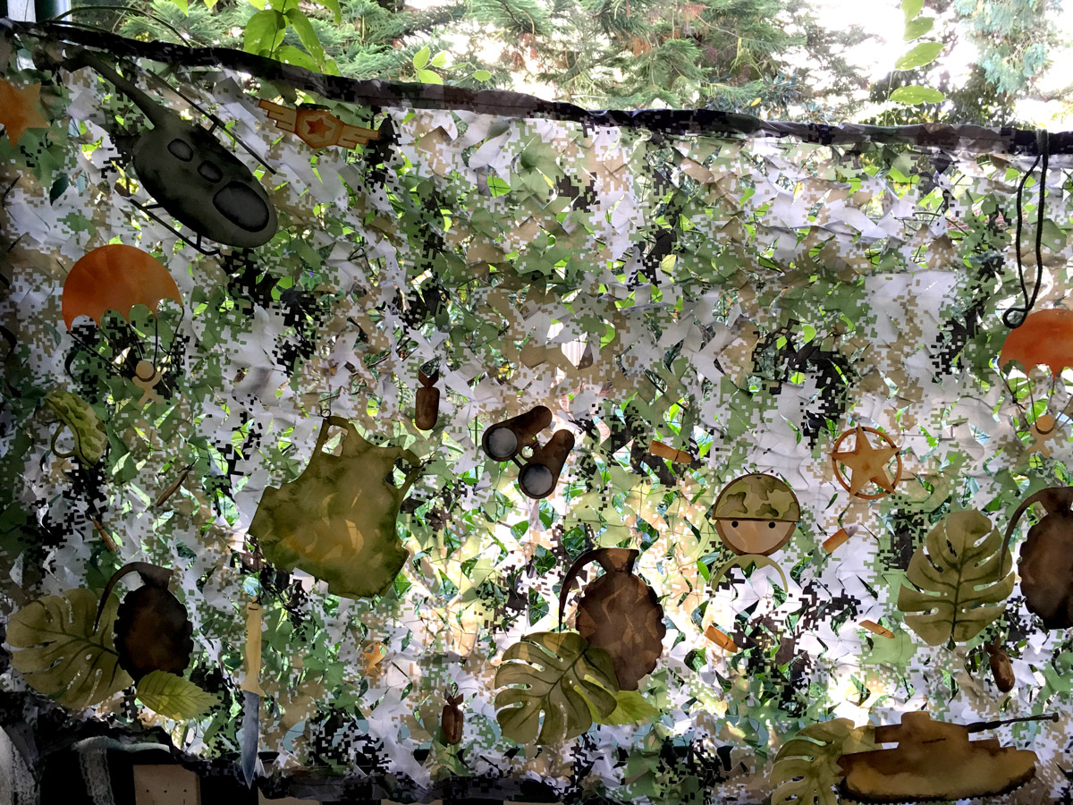 The camouflage netting once completed looks beautiful hanging outside against a leafy backdrop - the camouflage netting blending into the background perfectly. 