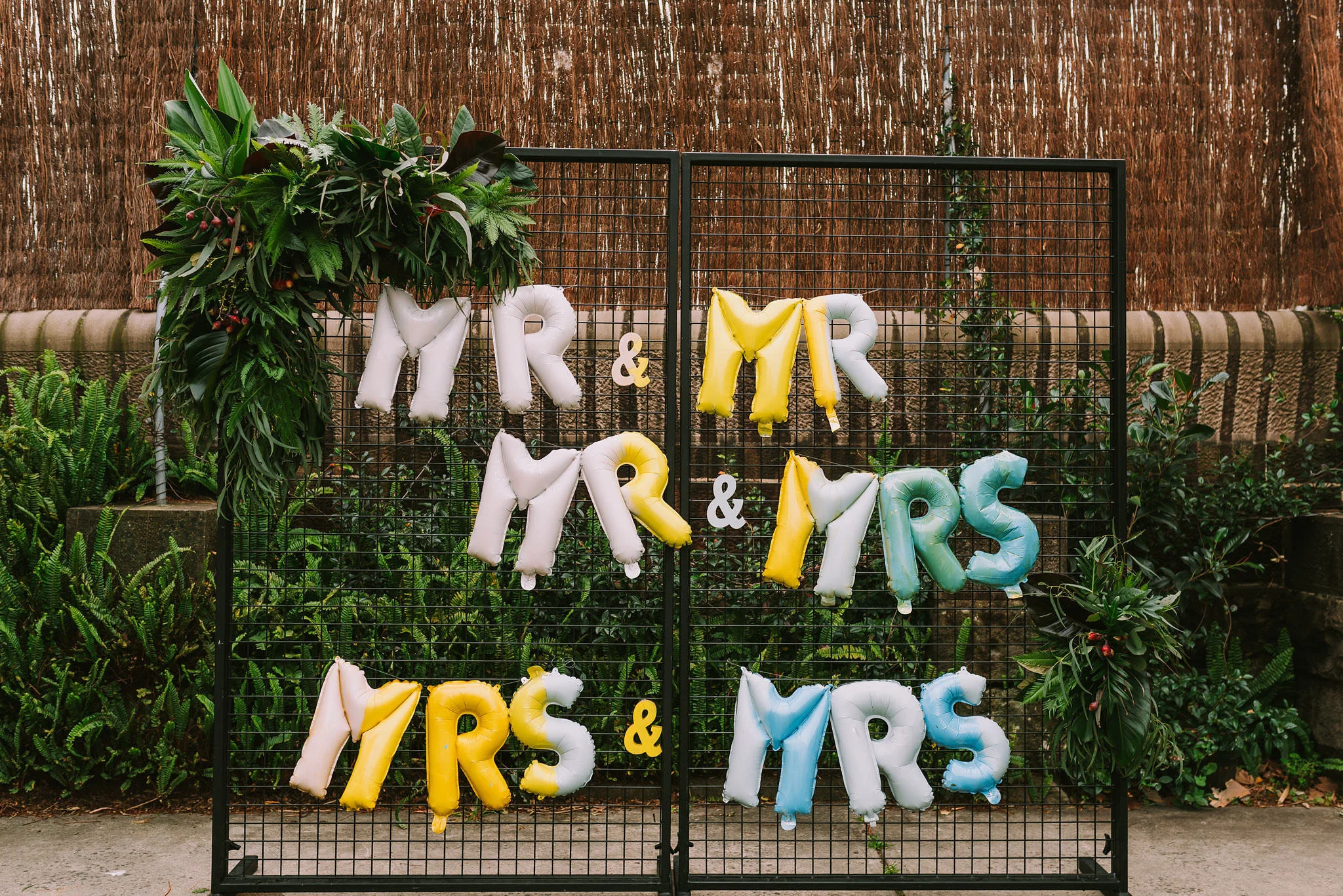 Foliage backdrop by Wild Dahlia Florals and Upside Down Events. Photo by Angus Porter Photography