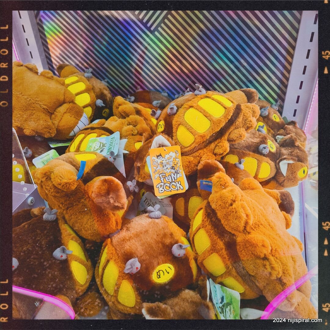 Weekly Photo: Catbus in UFO Catcher

This UFO machine had Catbus from Totoro. I had a Catbus somewhere in my plush collection. Have you seen Totoro? The characters in the story can enter inside the Catbus.

It would feel weird in real life because th