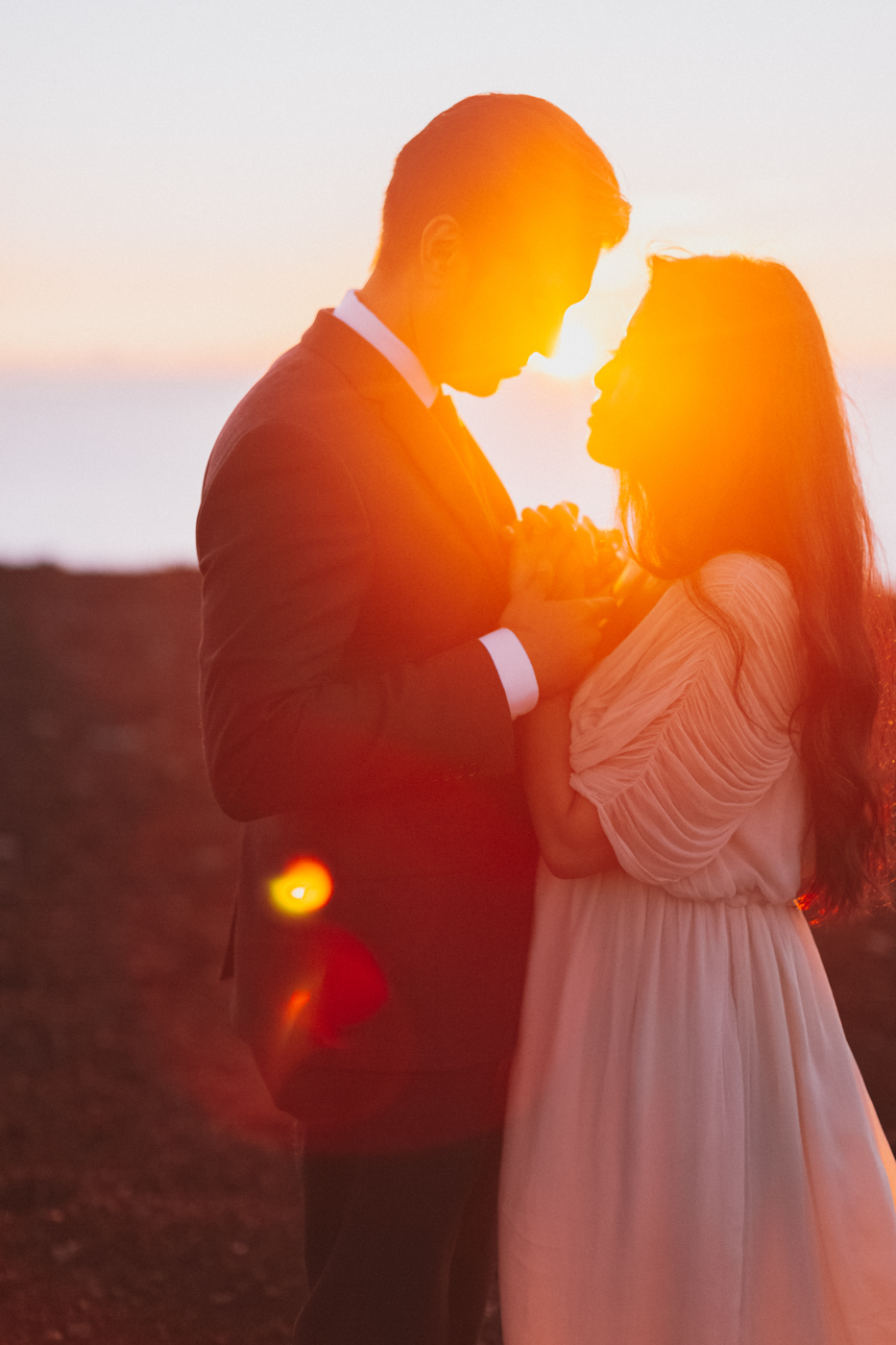 sunset first dance on top of haleakala of bride and groom