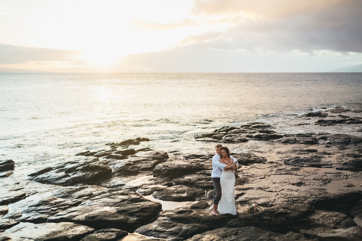 amazing merrimans kapalua wedding sunset view in lava rocks.jpg