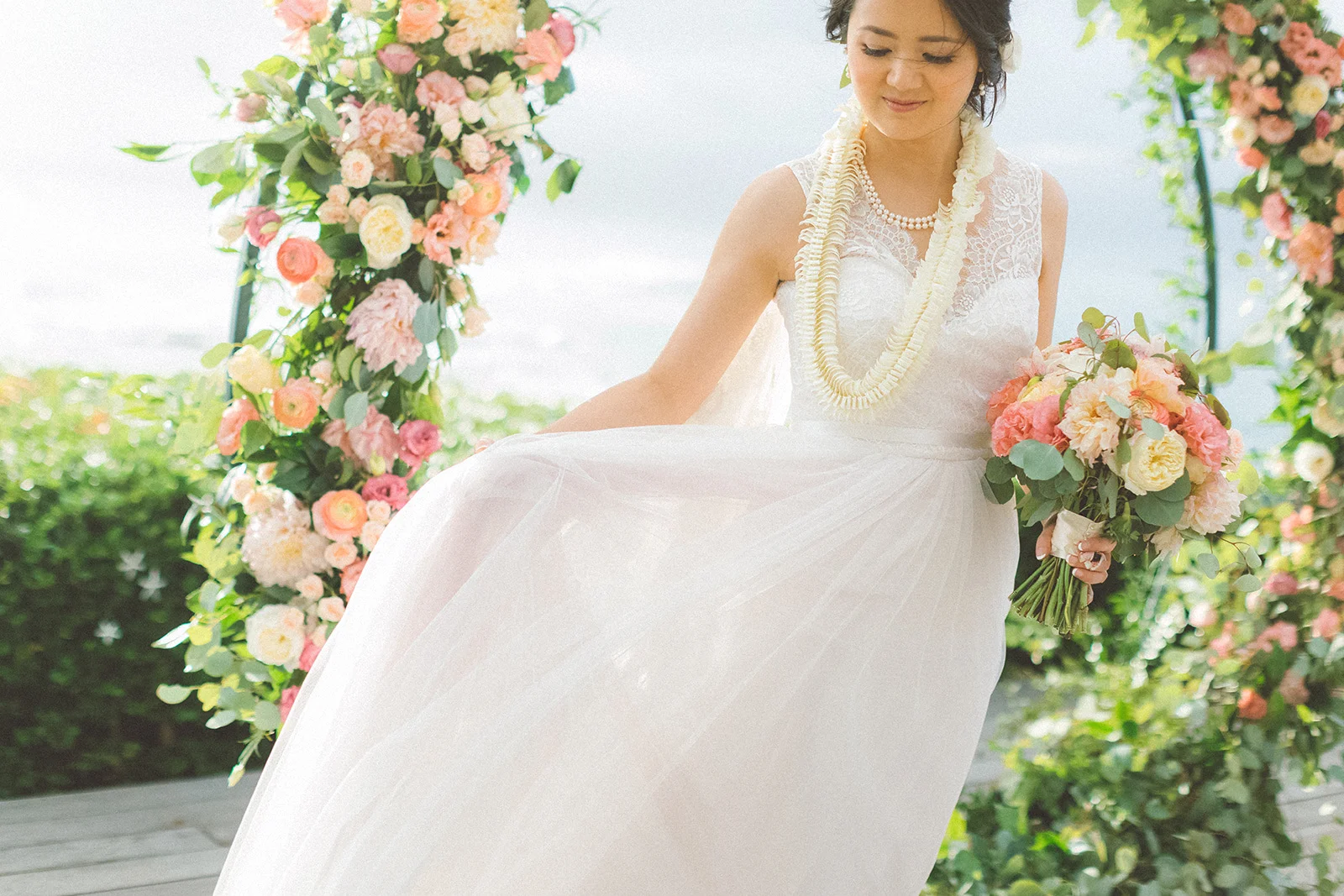 maui+beautiful+bride+in+floral+circular+arch+merrimans+kapalua+maui+wedding.jpg