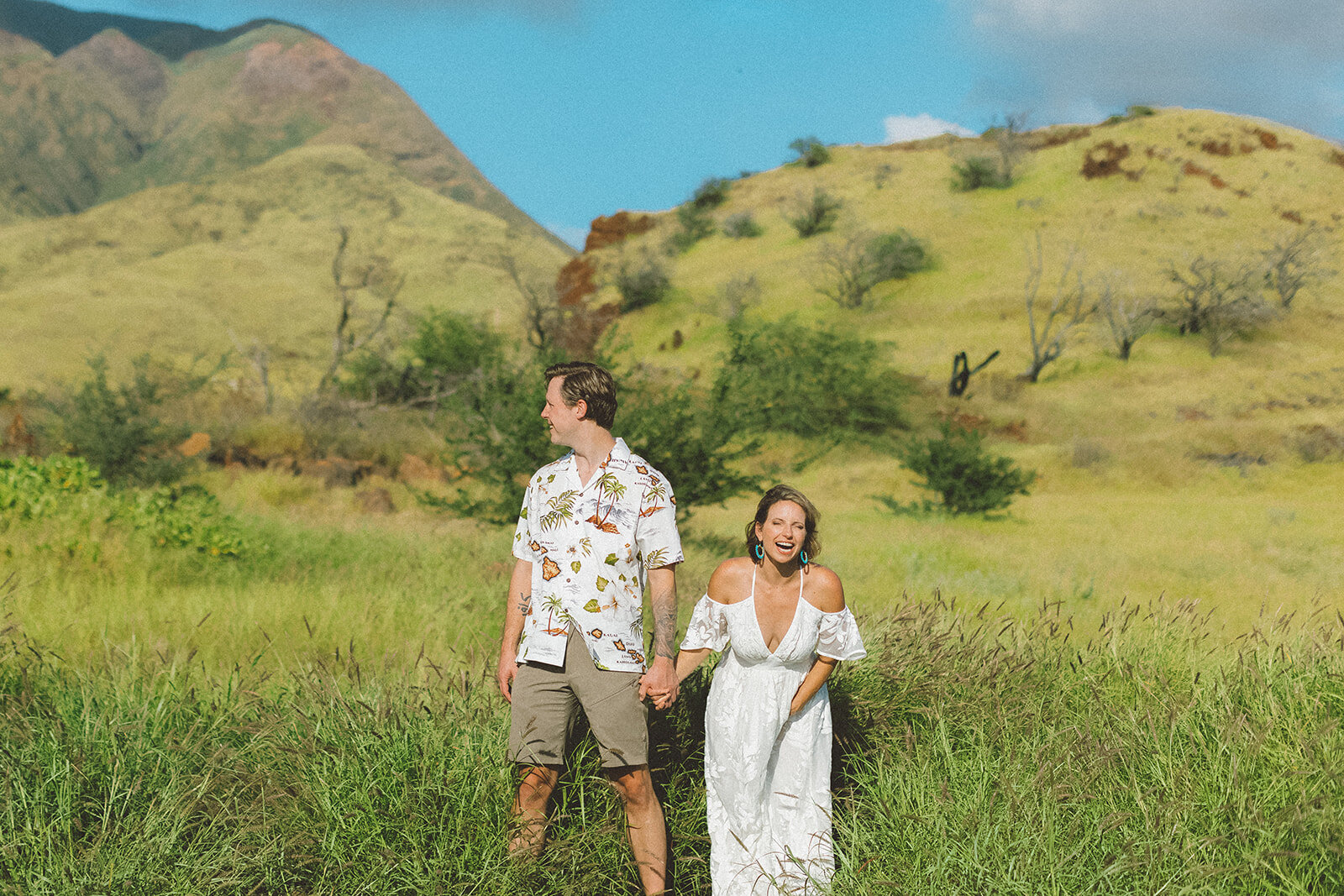  Top Maui Wedding photographer Angie Diaz Captures beautiful tropical engagement session with the perfect sun flare and romance your heart needed. Location: Palm Trees at Olowalu, Lahaina , Hawaii 