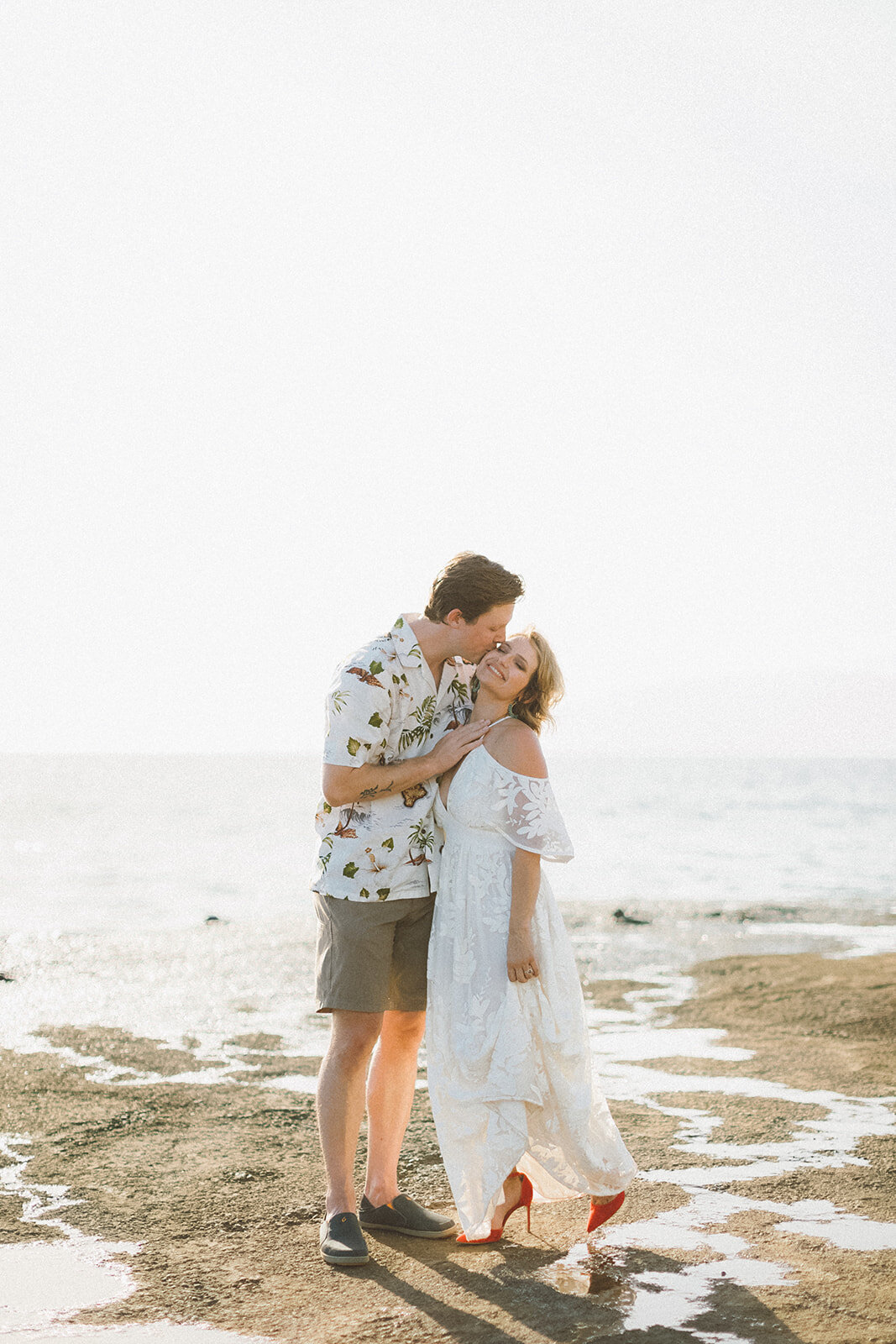 Top Maui Wedding photographer Angie Diaz Captures beautiful tropical engagement session with the perfect sun flare and romance your heart needed. Location: Palm Trees at Olowalu, Lahaina , Hawaii 