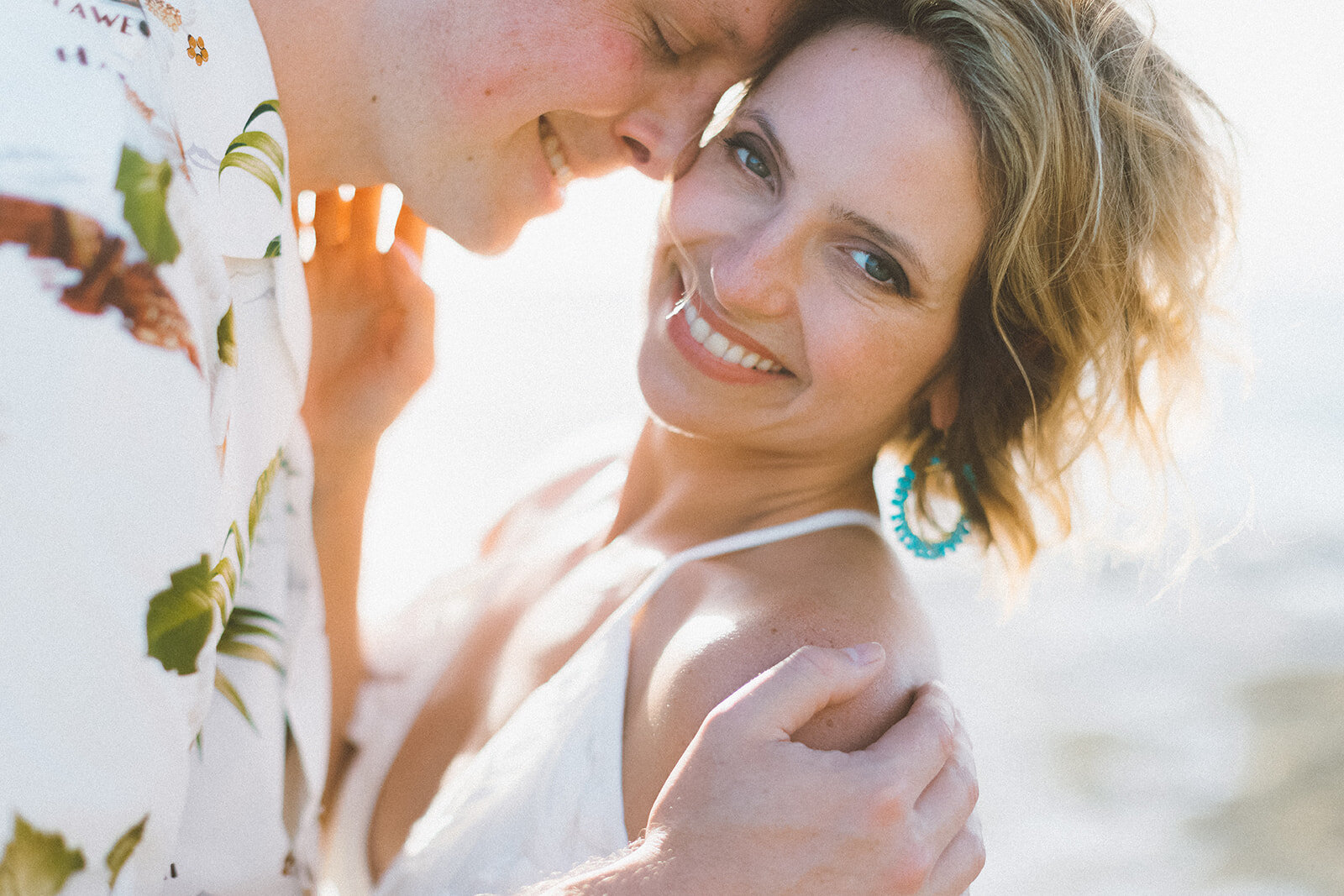  Top Maui Wedding photographer Angie Diaz Captures beautiful tropical engagement session with the perfect sun flare and romance your heart needed. Location: Palm Trees at Olowalu, Lahaina , Hawaii 