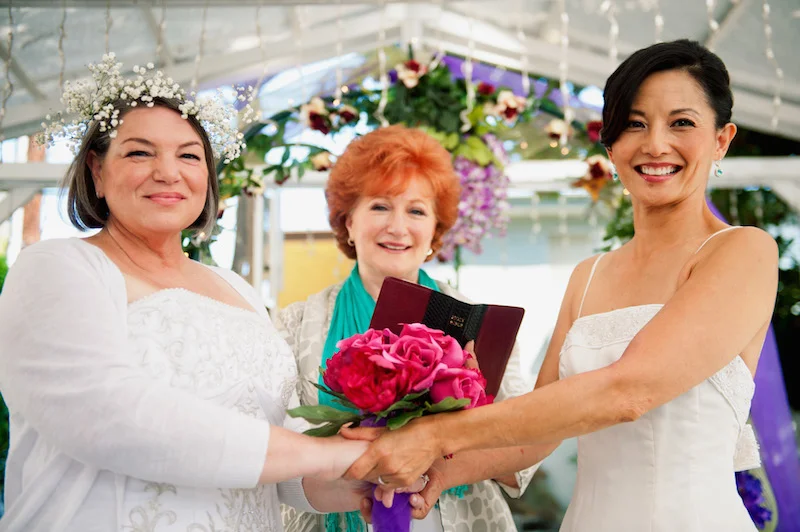 Mindy Cohn and Tamlyn Tomita in Operation Marriage