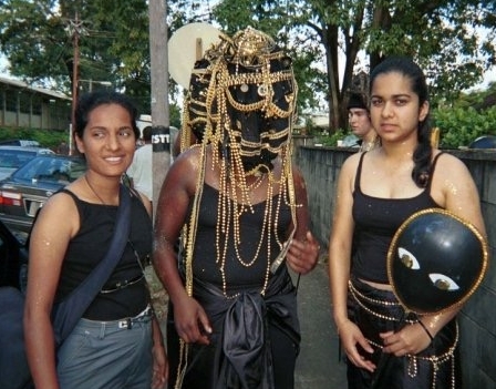 That's me in the headdress in Peter Minshall's "This is Hell" section 