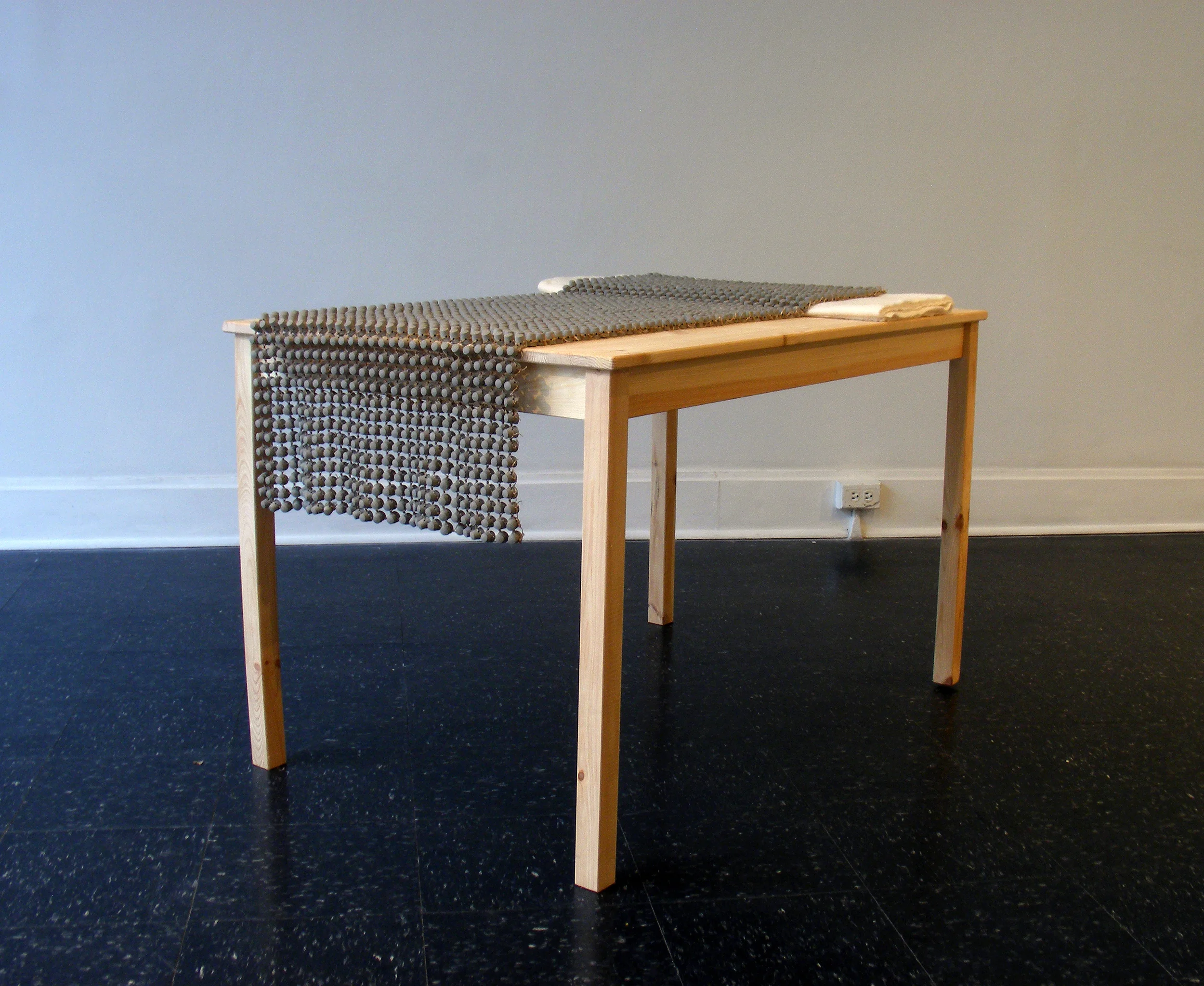 Affirmation 2016 ceramic, waxed thread, pine table, cotton batting