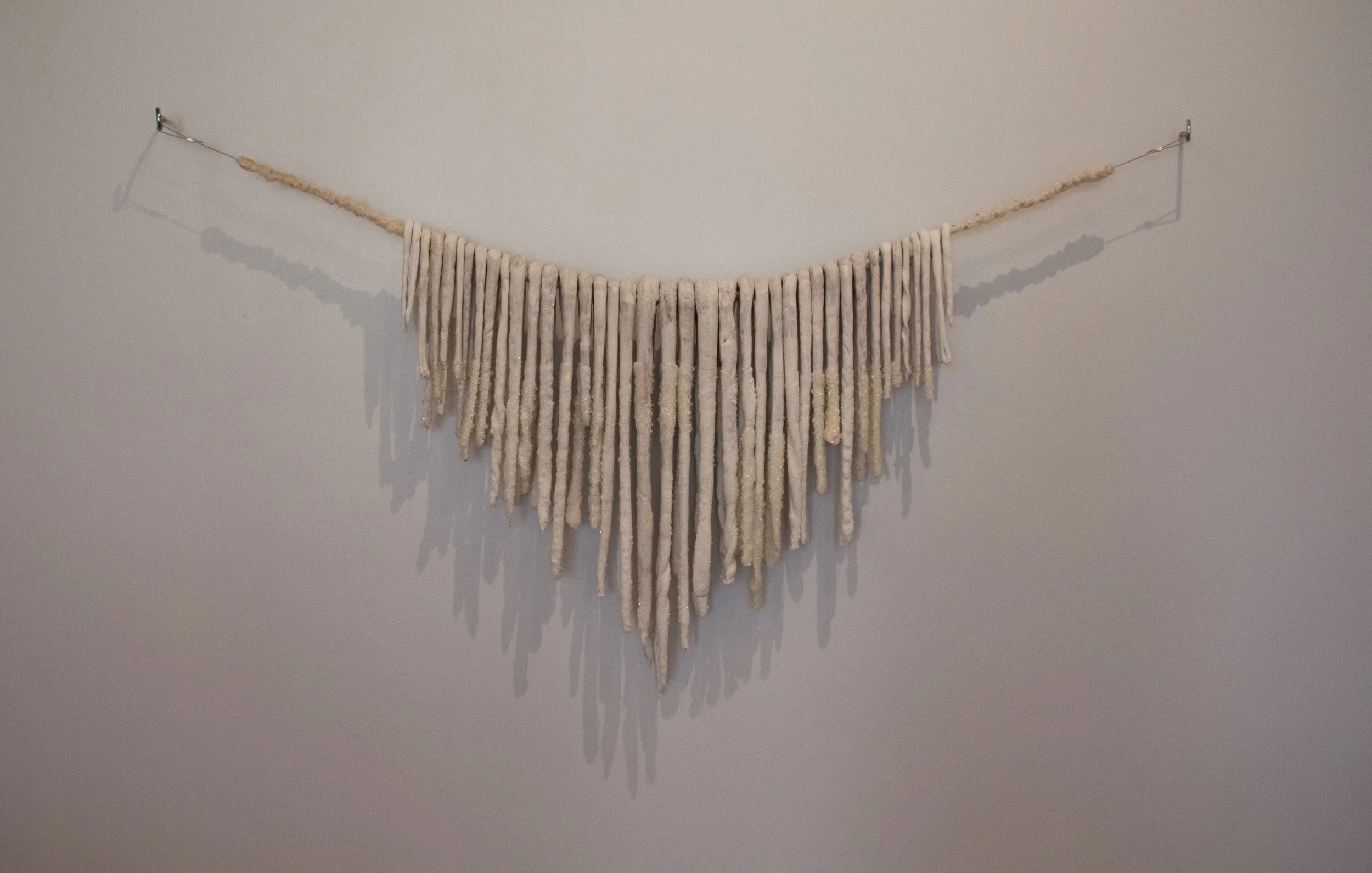 Salt & sorrow 2018 terra cotta, underglaze, fiber, borax, hardware.
