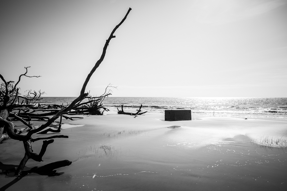 The black box: Accompanying some of the odd odors was this ominous-looking box off in the distance. Is that a septic tank?Indeed, there used to be beachfront cabins along this part of the beach. Nowadays, only a couple are left standing, teetering on the verge of collapse, and have long since been abandoned. No doubt this concrete structure is a remnant from one of these properties.