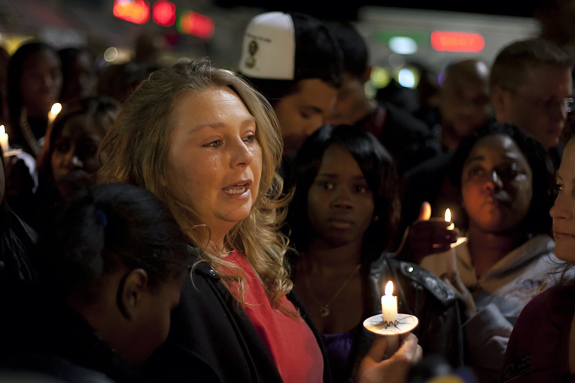 Candlelight vigil for shooting victims: