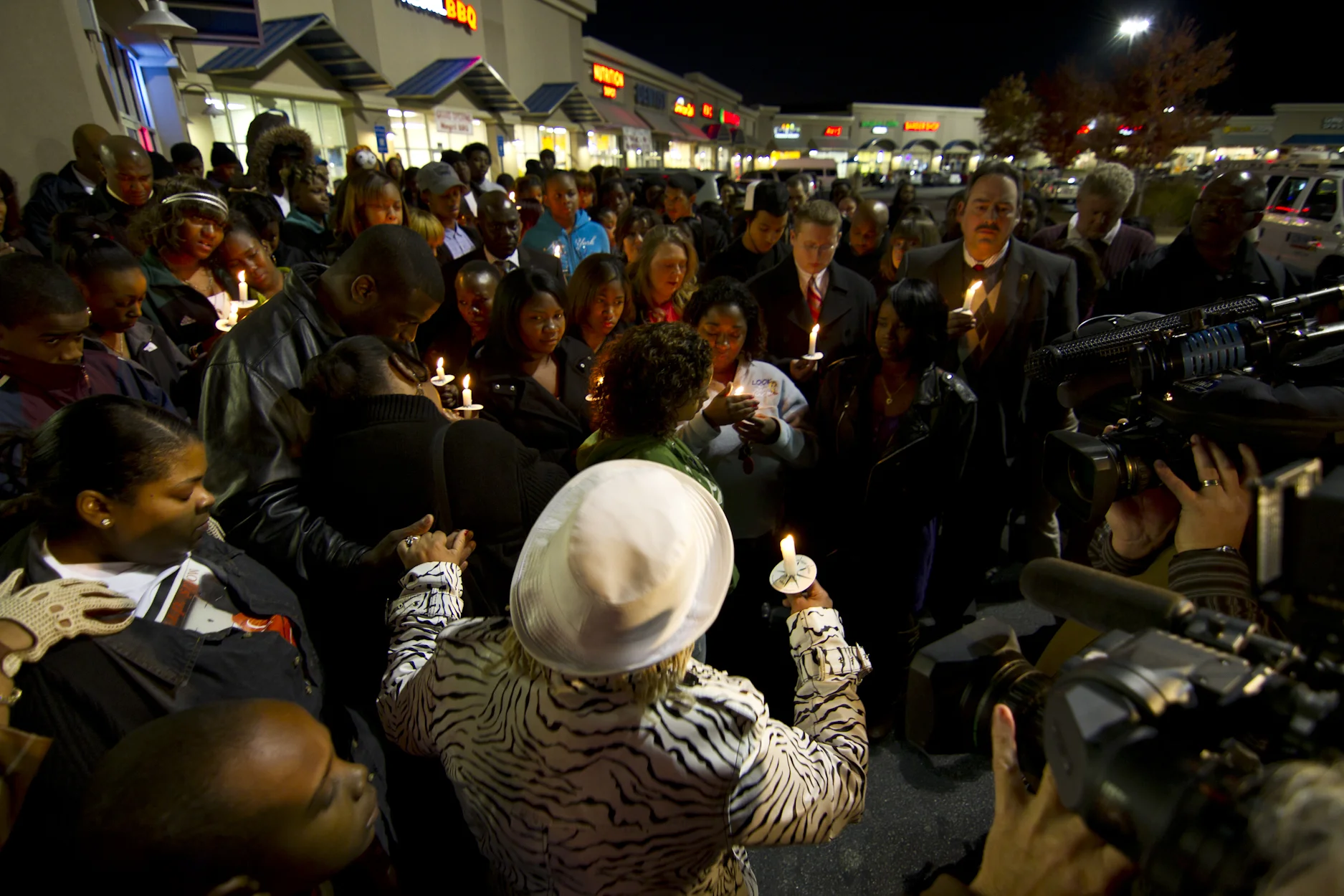 Candlelight vigil for shooting victims: