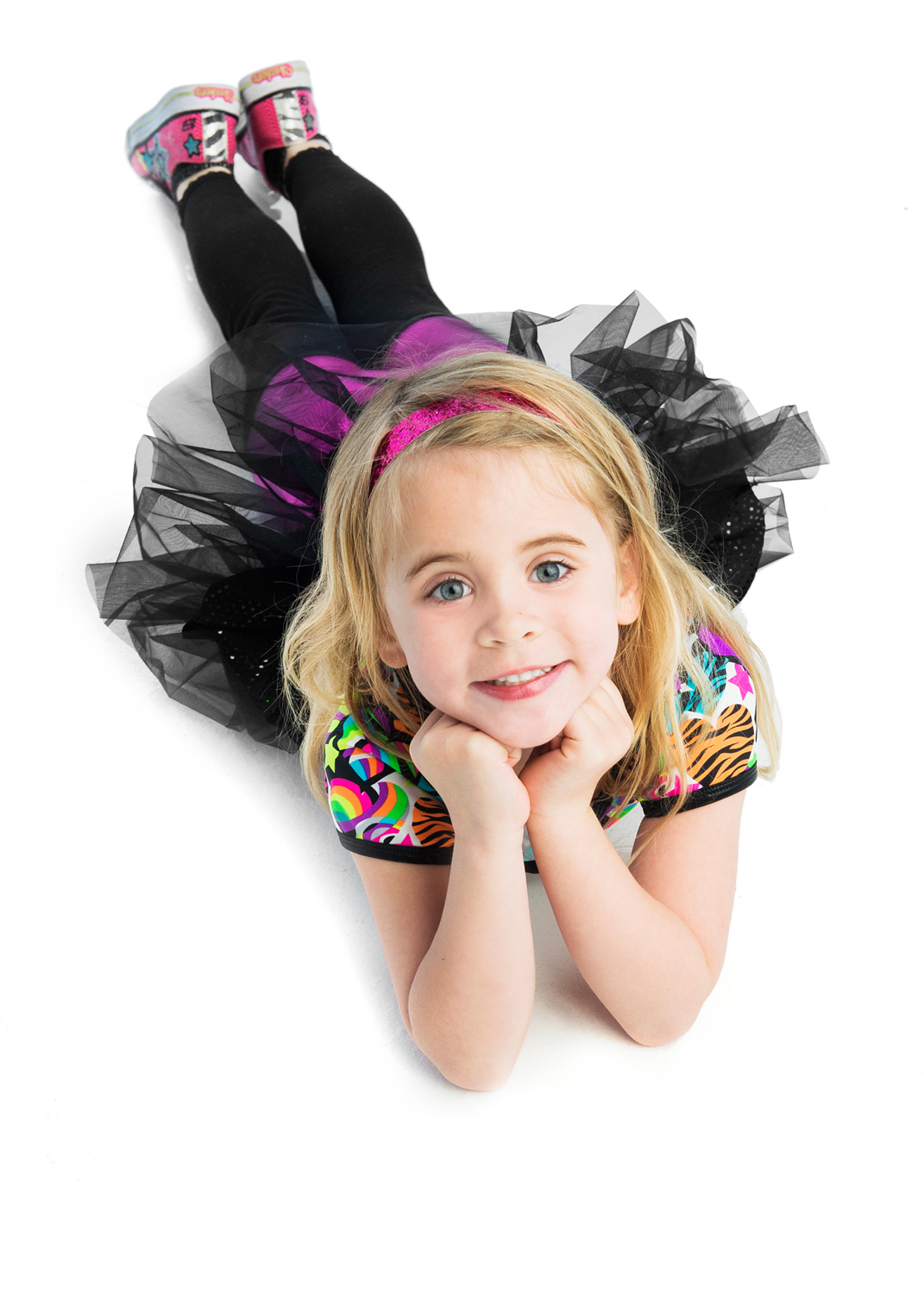 Nicole is a Chicago-based child photographer, family, baby photographer, commercial photographer, specializing in children's photography in Chicago, the Chicago North Shore suburban area and San Diego.