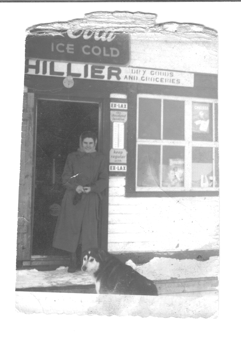 Newfoundland - Zilda Hillier in front of Donald Hillier's store.jpg