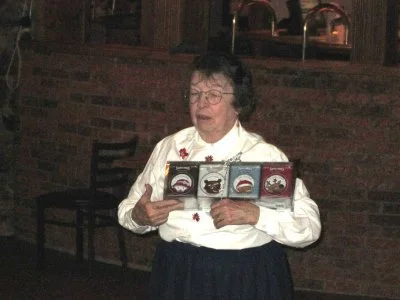 Joyce explains the rules to "pick a gift and get it stolen"