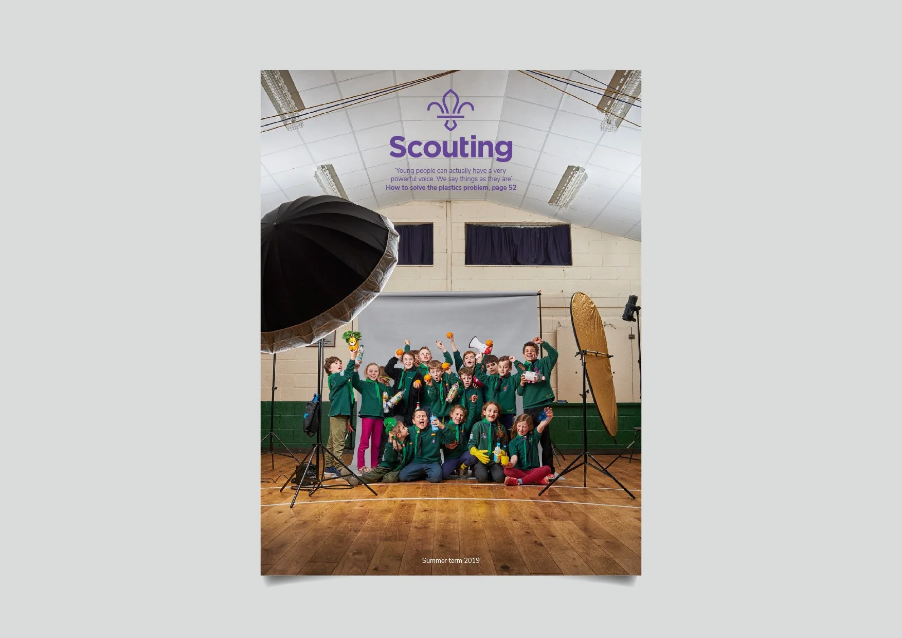Cover of the Scouting magazine featuring a group of scouts at a scout hall meeting