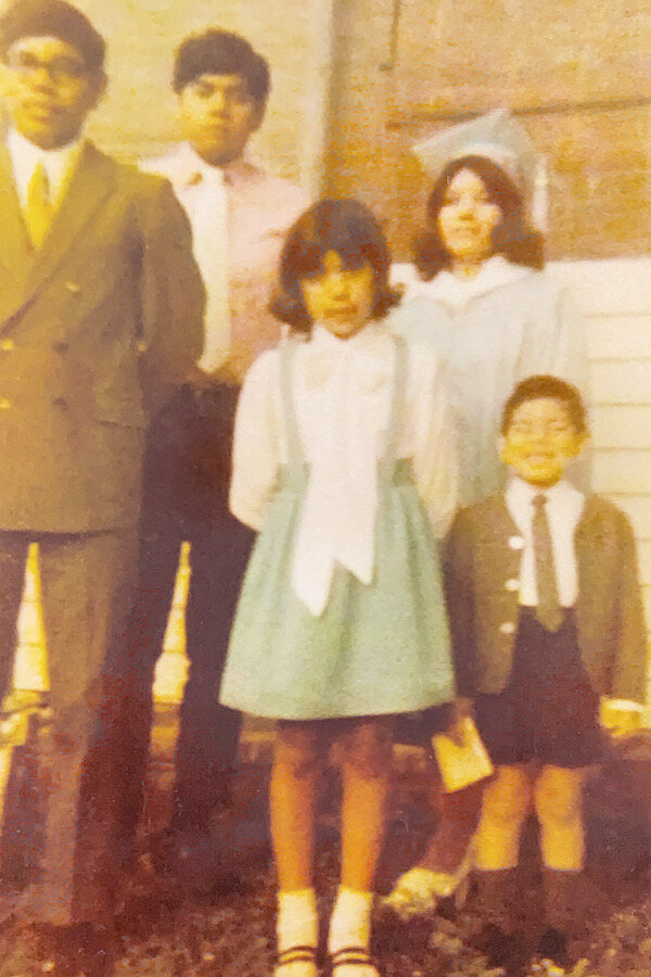 My dad (in the white tie) and his siblings