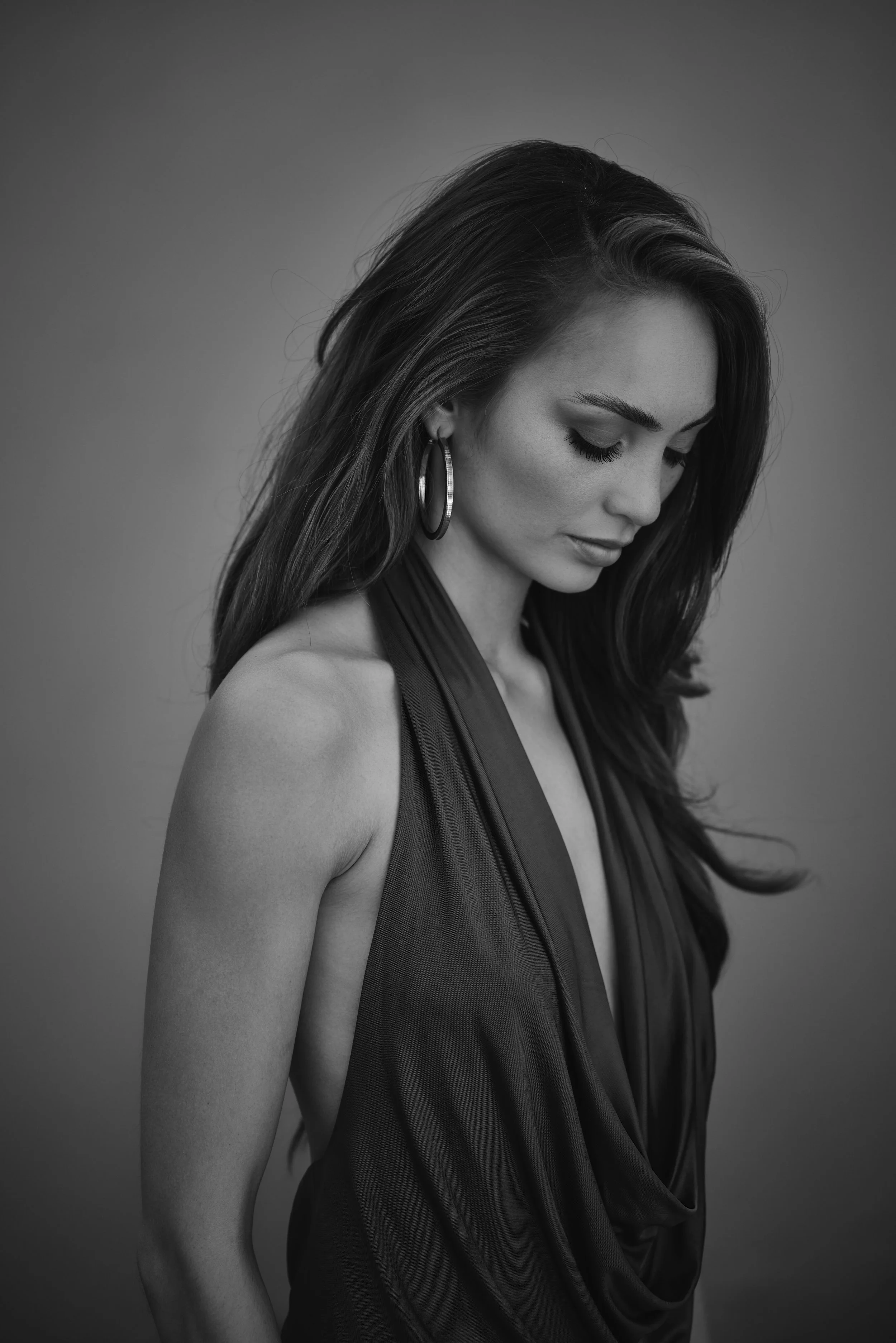 lack and white portrait of Miss Universe R'Bonney Gabriel, showcasing quiet elegance in a fine art style