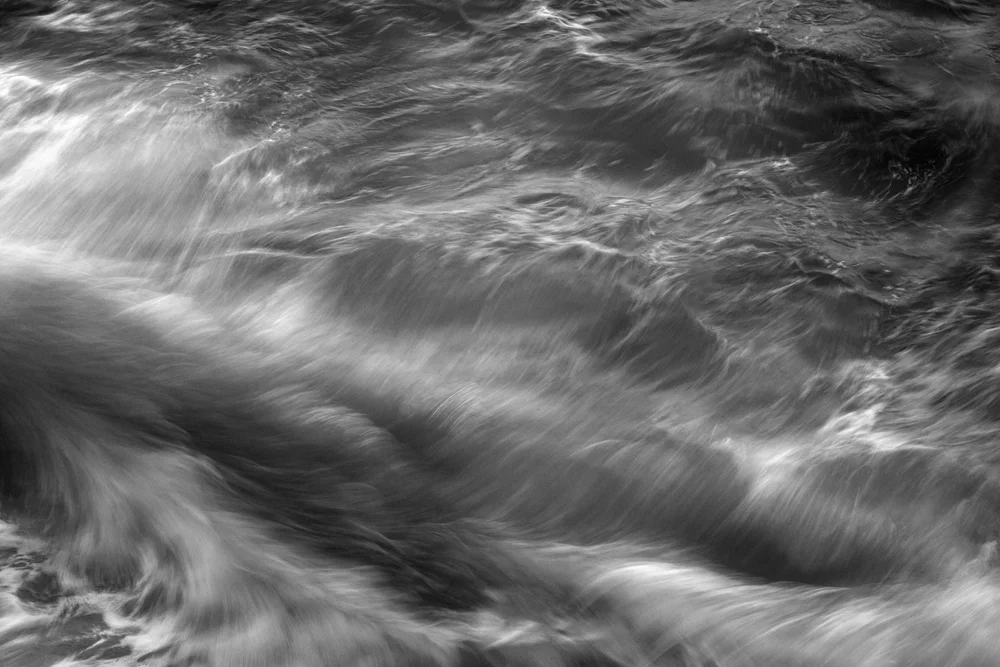 Foreground wave appears as some giant furry creature