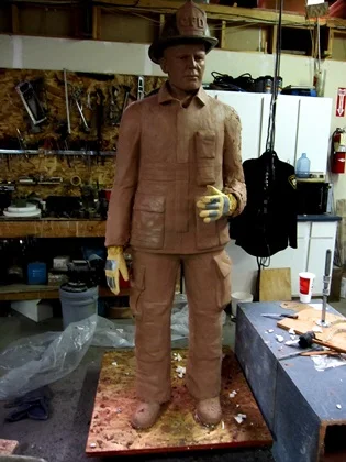 Statues.com   Life-Size Clay FiremanSm.JPG