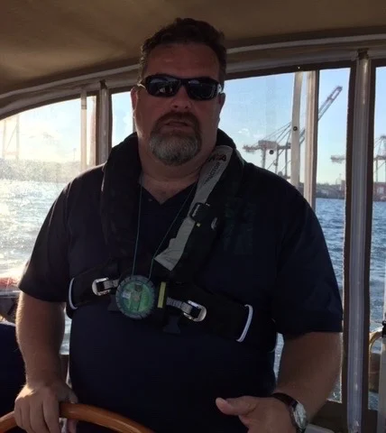 Chris at the wheel in Halifax Harbour!