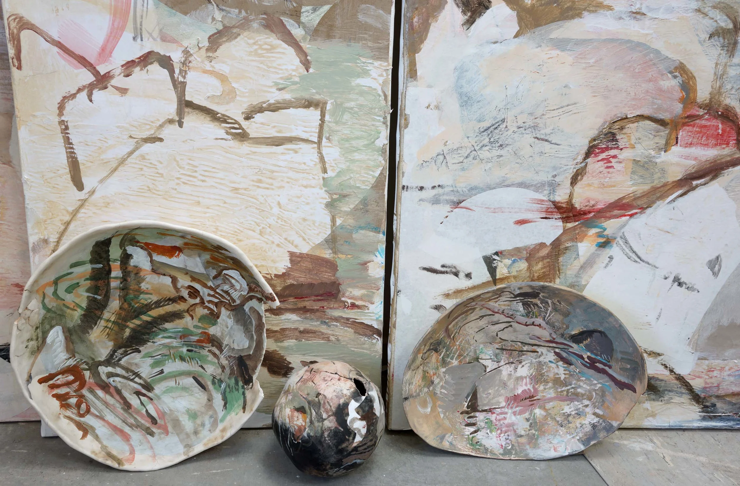 susan watt's ceramic platters & bowl i've painted over the past week, sitting on the studio floor with recent brother & sister paintings. link below will take you to the new studio paintings page, where these paintings can be viewed.