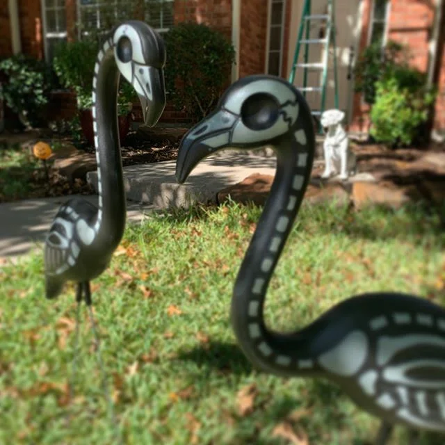 The decorating is underway. Better late than never. #skeletonflamingos