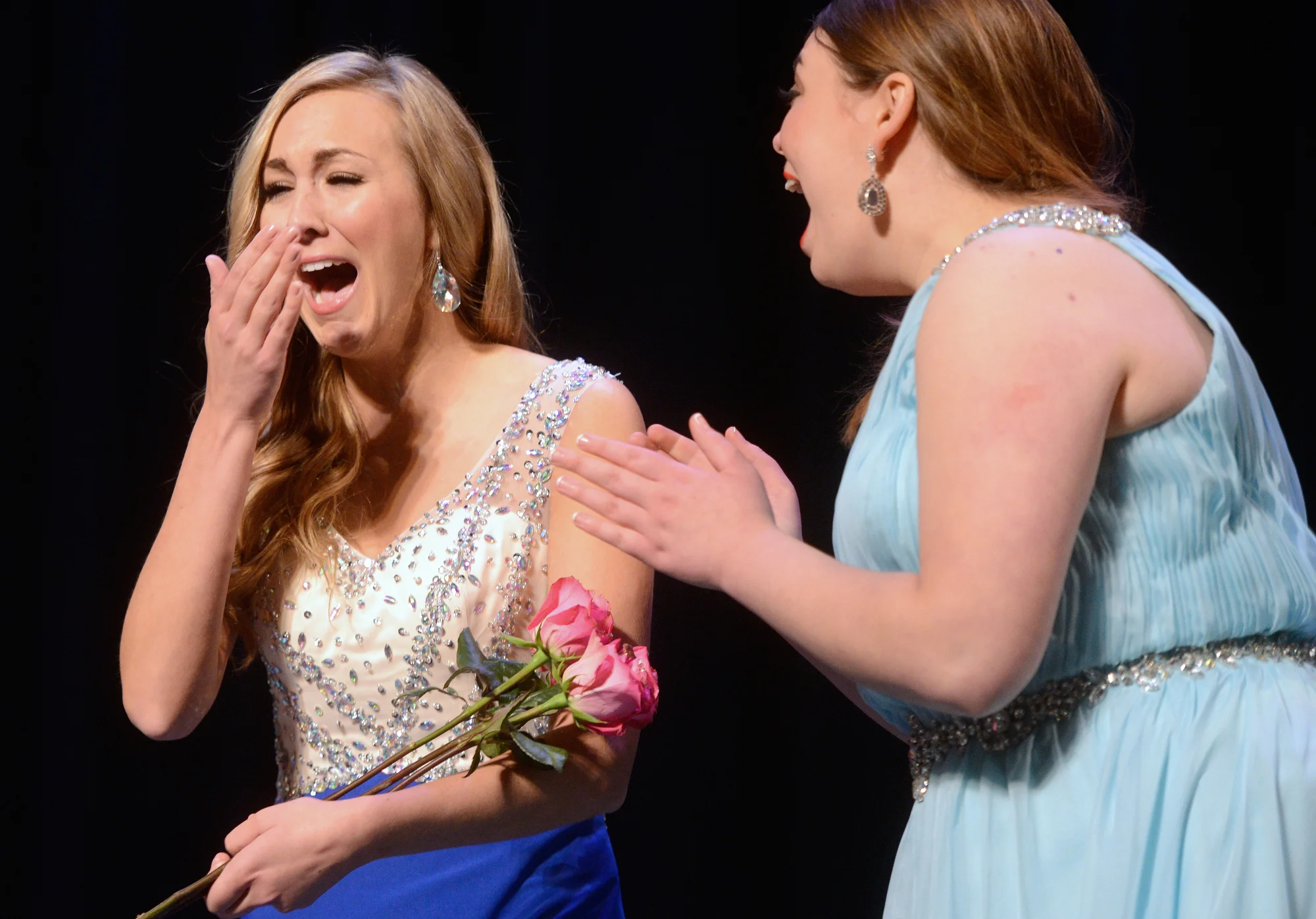 Jennie Collins reacts to the announcement that she will become Miss Green Bay Area 2015 at the Meyer Theatre in Green Bay, Wis. on Saturday, Jan. 24, 2015. 