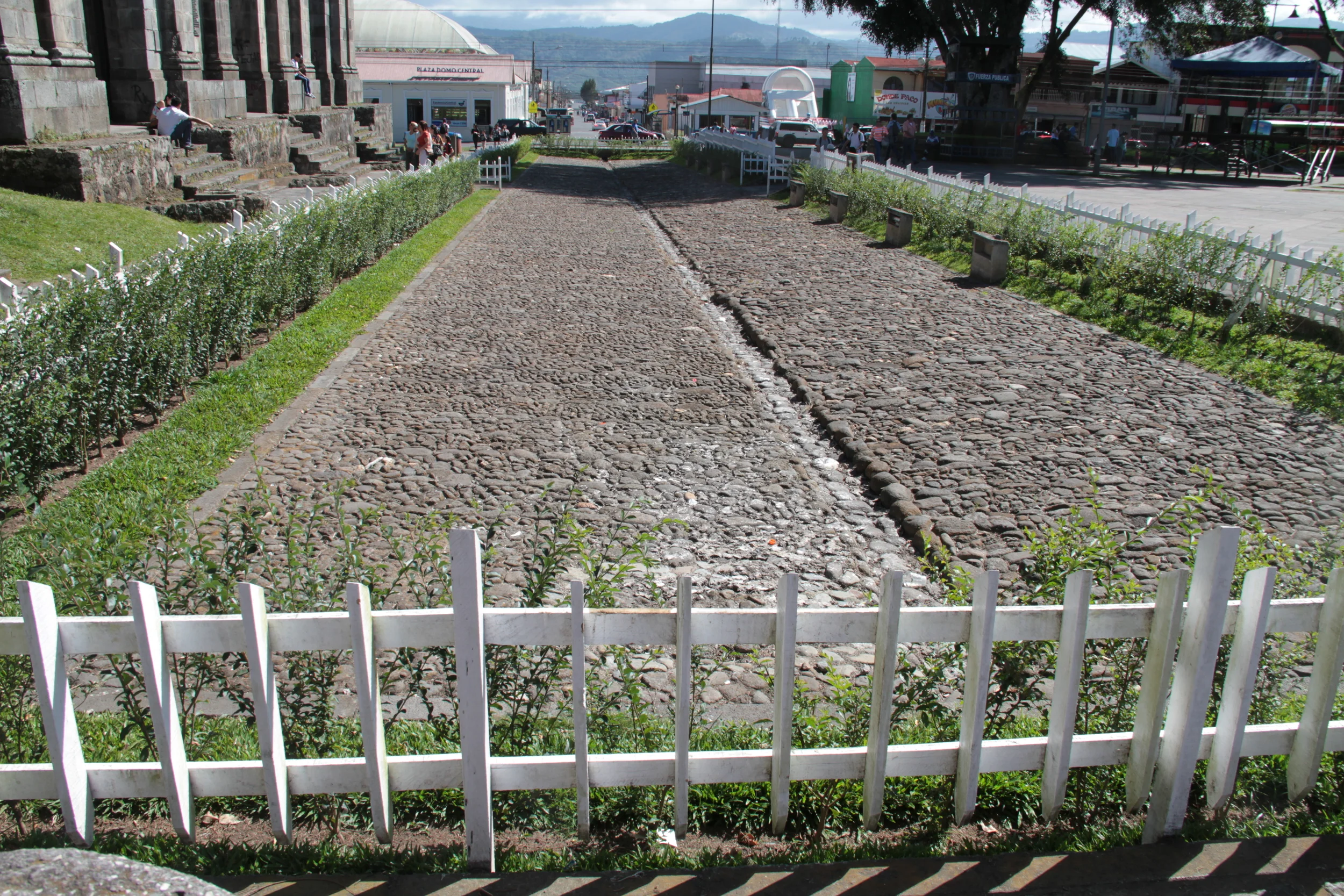  In the city of Cartago, there exists church ruins. &nbsp;The photo is the 'road' that ran in front of the church. &nbsp;Notice the gutter running down the center. &nbsp;The road is sloped down to the center so coach and horse&nbsp;riders would keep 