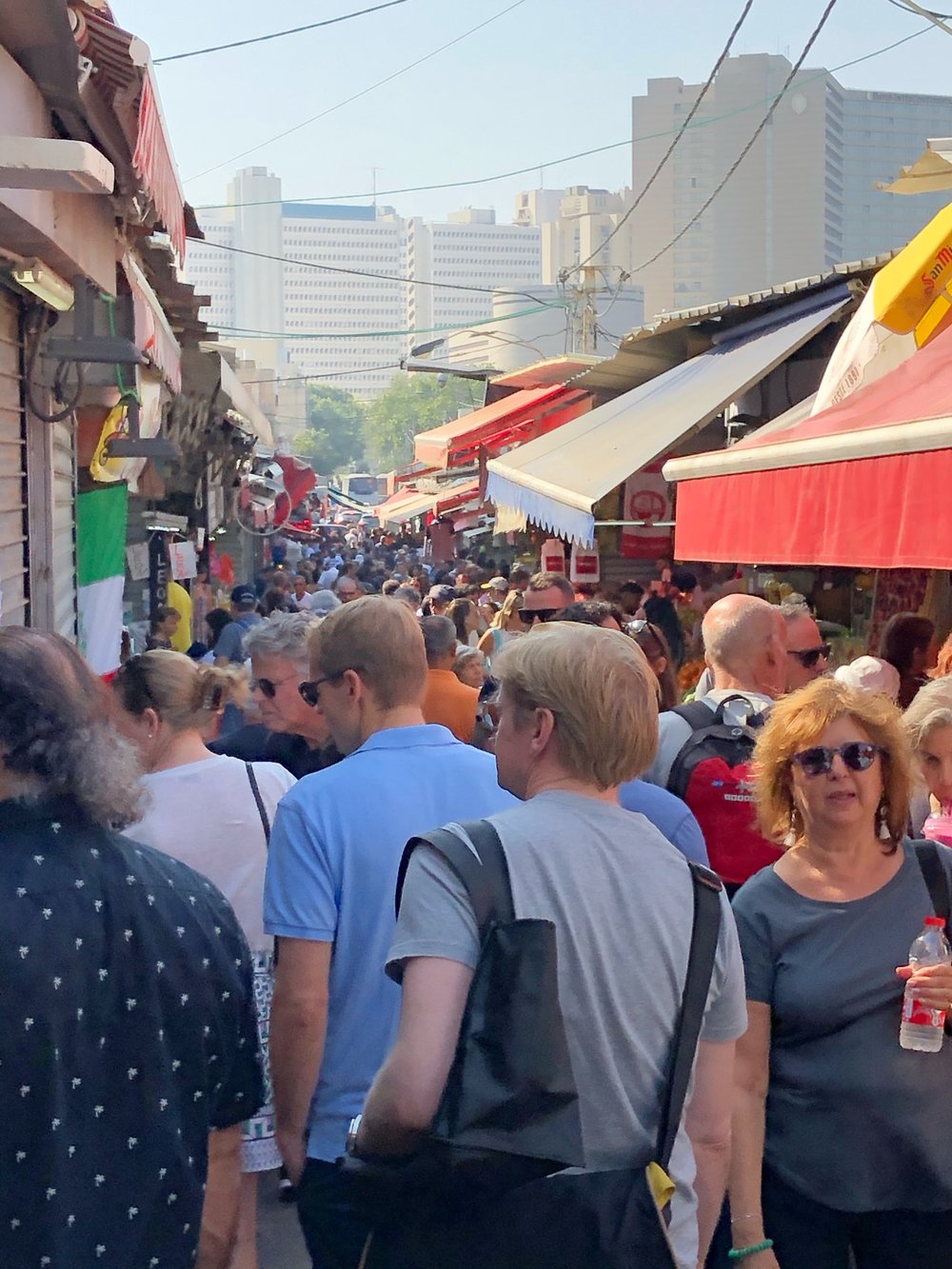 Shoulder to shoulder at the Carmel Market  