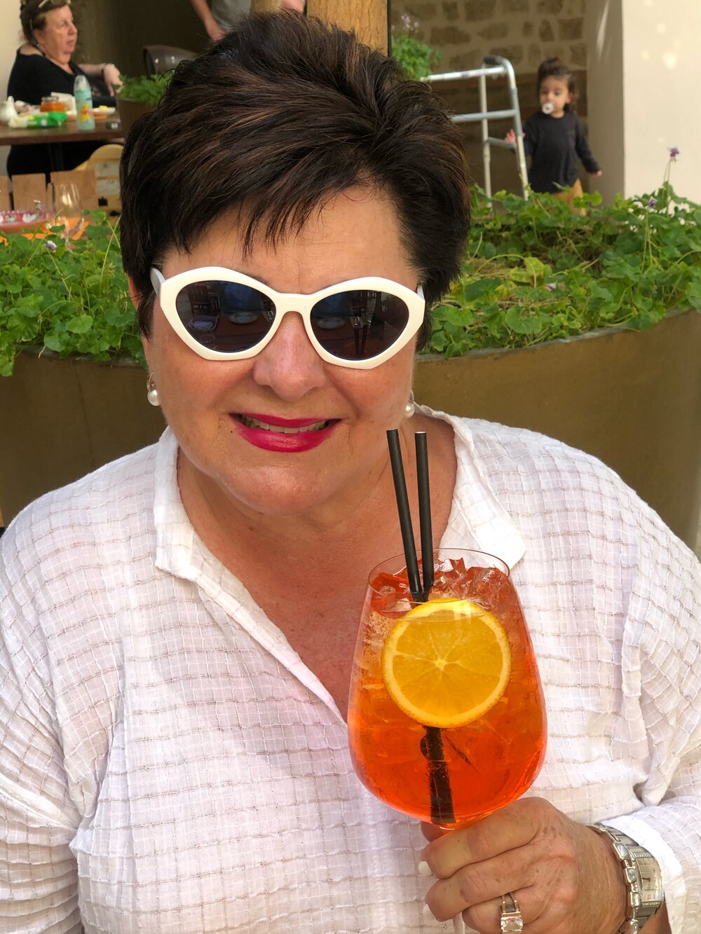 Hot lady, cool drink... the Aperol spritz. 