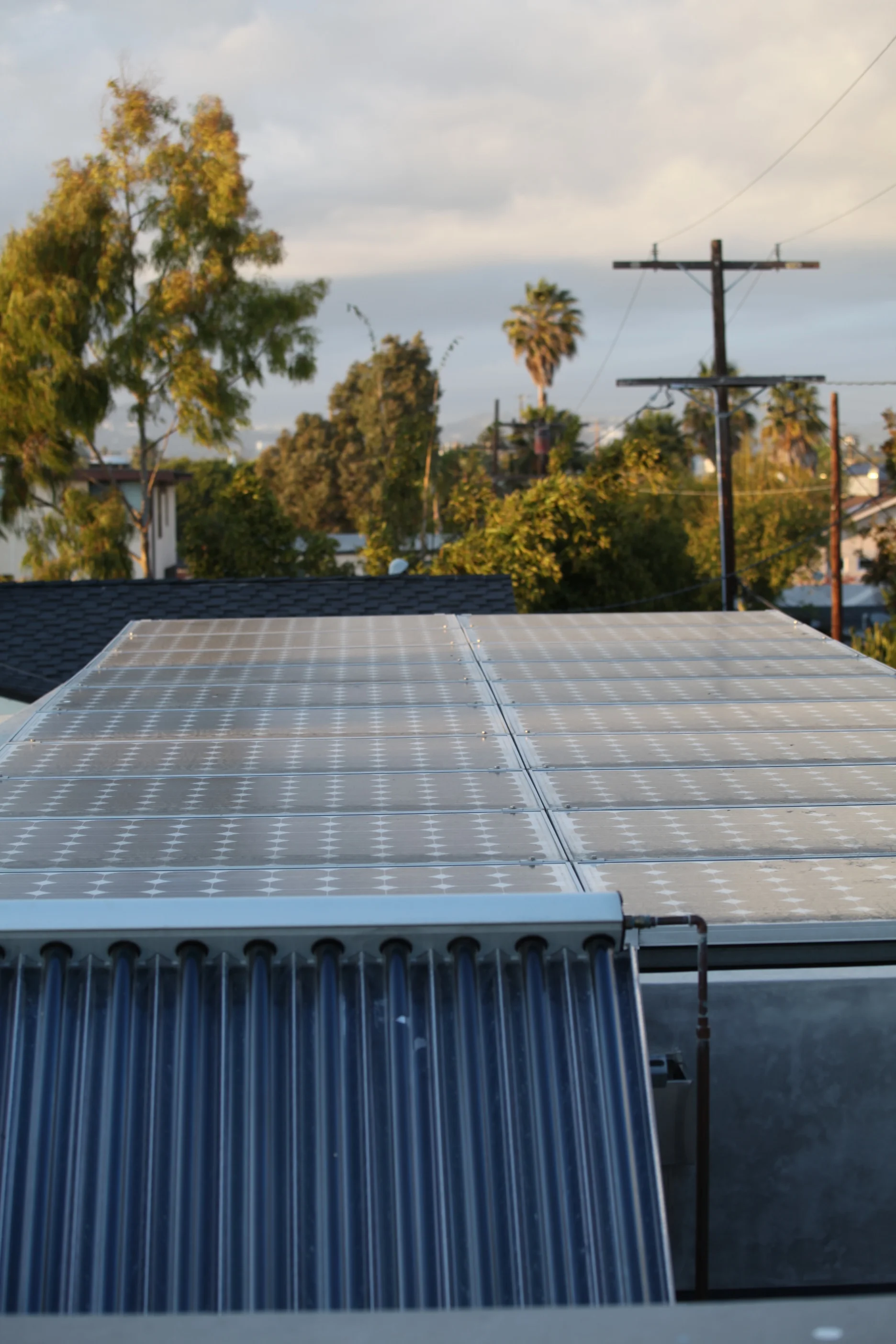 Photovoltaic panels and evacuated tube solar collectors on top of the McKinley House were an important part of the residence’s energy balance and sustainable portfolio.