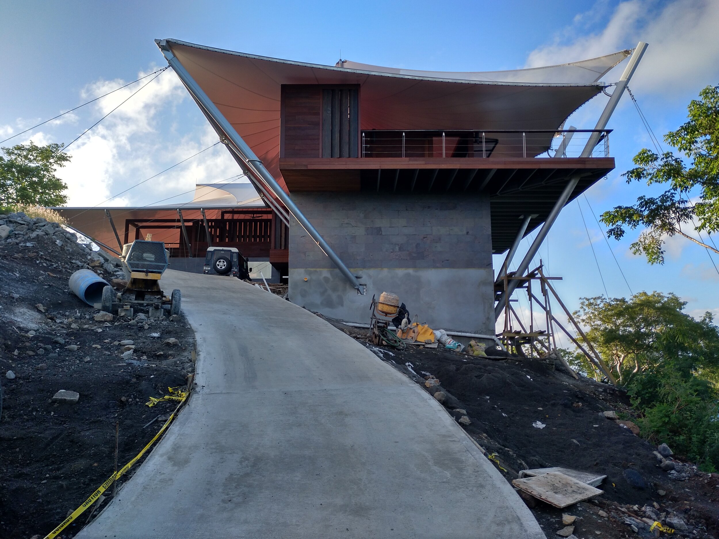 S.E.A.-Studio-Environmental-Architecture-David-Hertz-FAIA-Sail-House-Cloud9-Bequia-Saint-Vincent-Grenadines-Caribbean-Island-sustainable-regenerative-restorative-green-design-hospitality-tropical-resort-hotel-biomimetic-master-bed-exterior.jpg