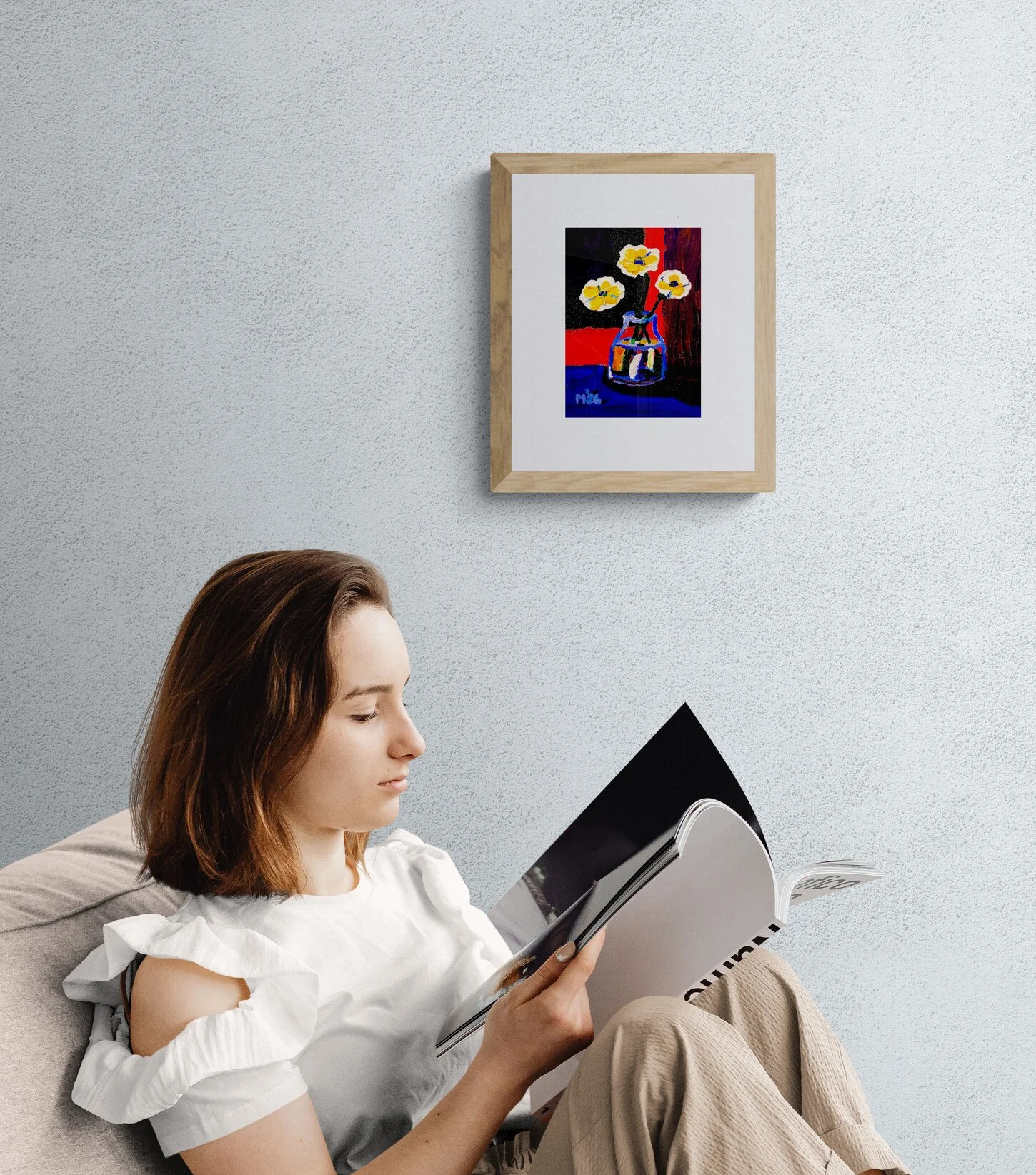 girl-reading-a-book-next-to-a-wall (1).jpg