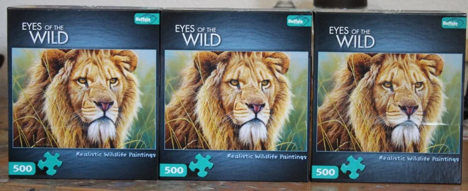 Buffalo Games, New York. Eyes of the Wild. Jigsaw Puzzle with the wildlife art of Eric Wilson. - King of Beasts - Lion Portrait.