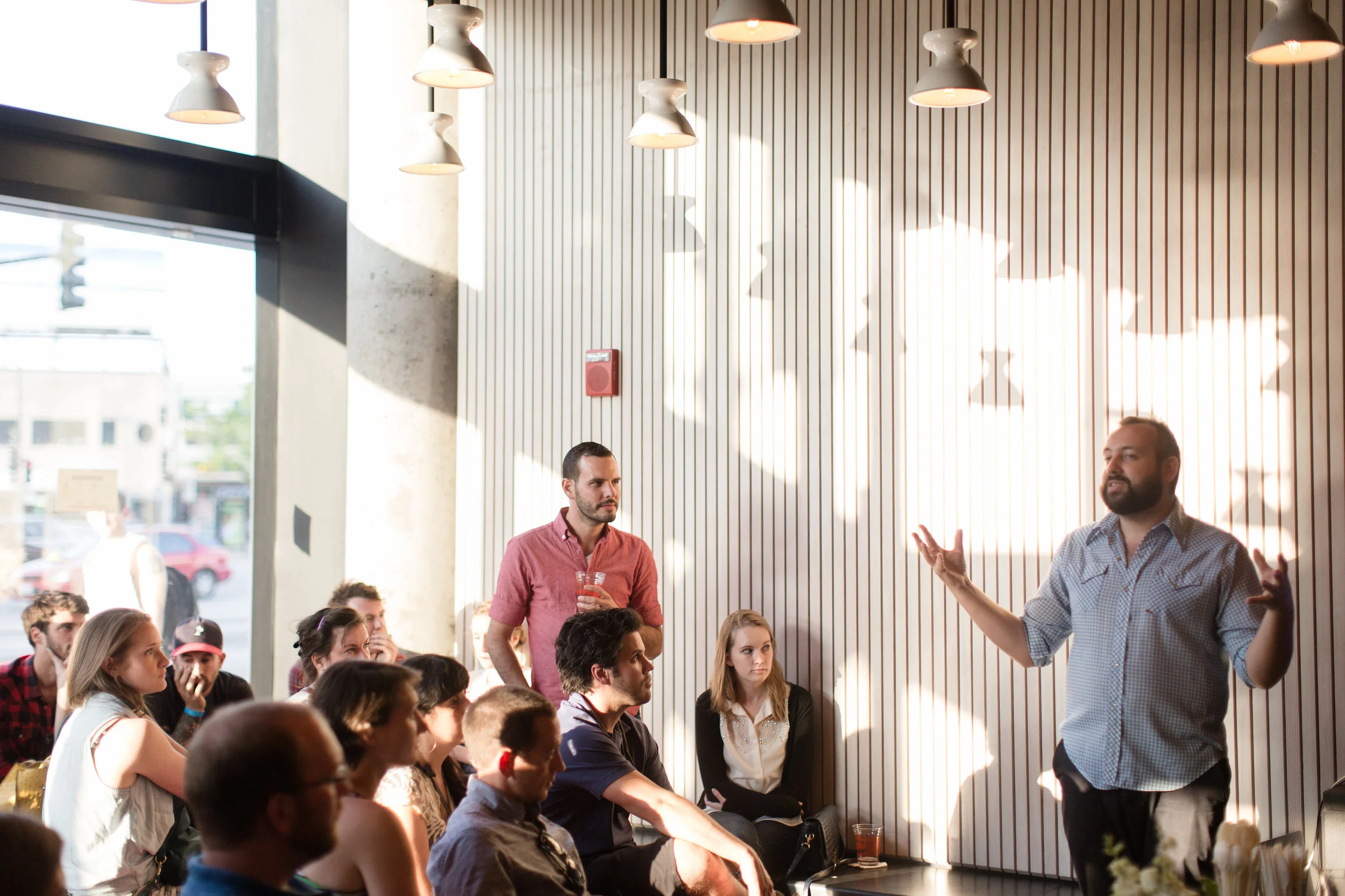 Standing left: Ryan Knapp of MadCap Coffee, standing right: Stephen Morrissey of Intelligentsia Coffee