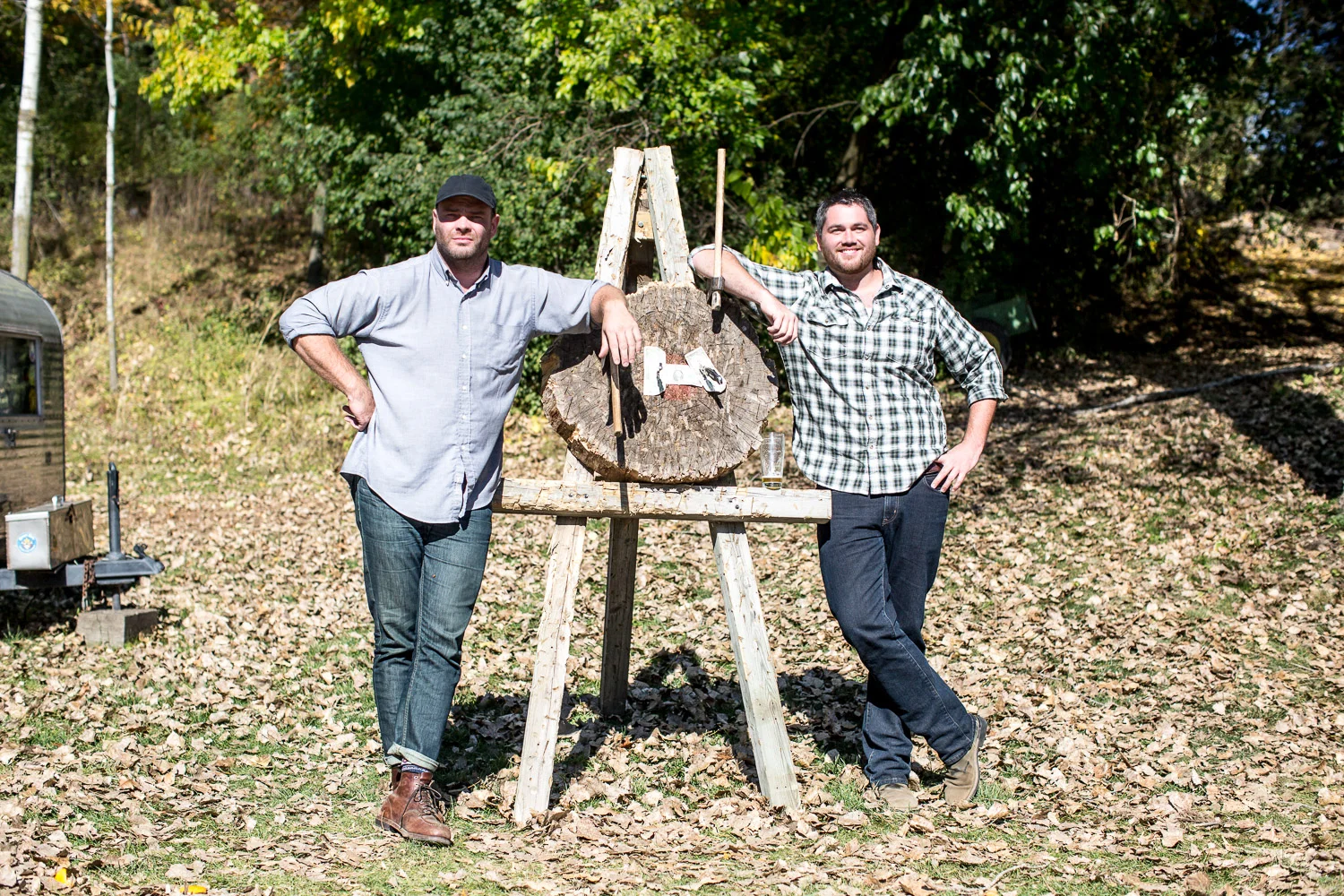 Musician Andrew Thiboldeaux and Nick Pankey, ax tossing champions